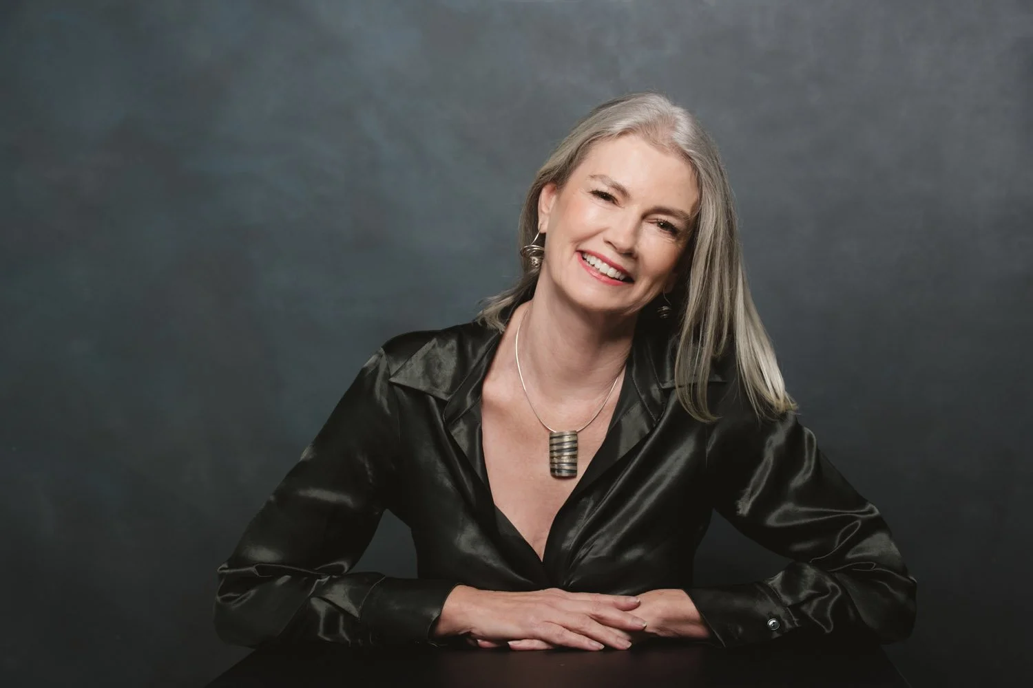 Portrait of fine-art photographer Siobhán Costigan, whose self-portrait based practice explores memory, landscape, vigilance, and psychological presence
