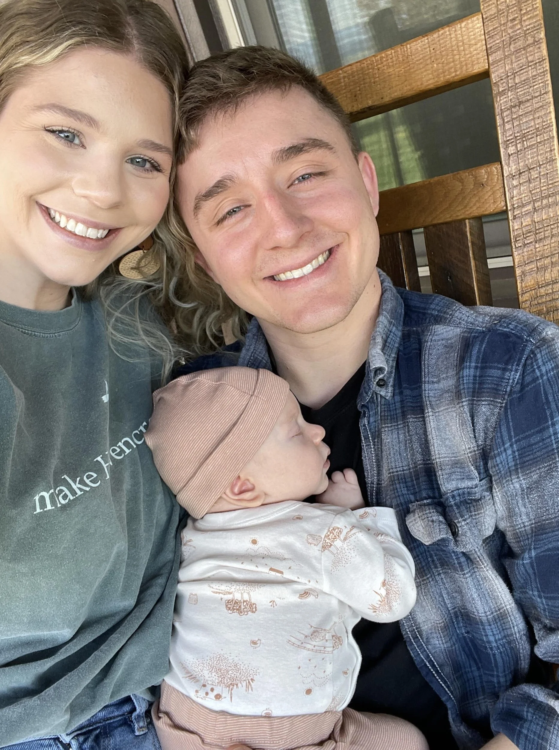 Photo of family with baby. Are you looking for an online travel agent for cruises? Check out my services and book a free consult!