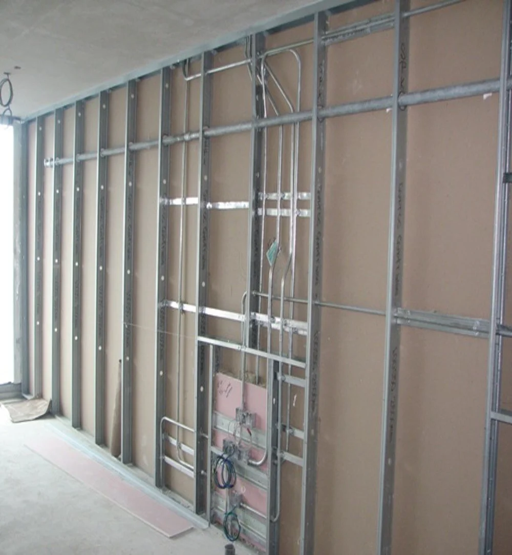  Fixing of wiring and other services before installing the other side of the wall 