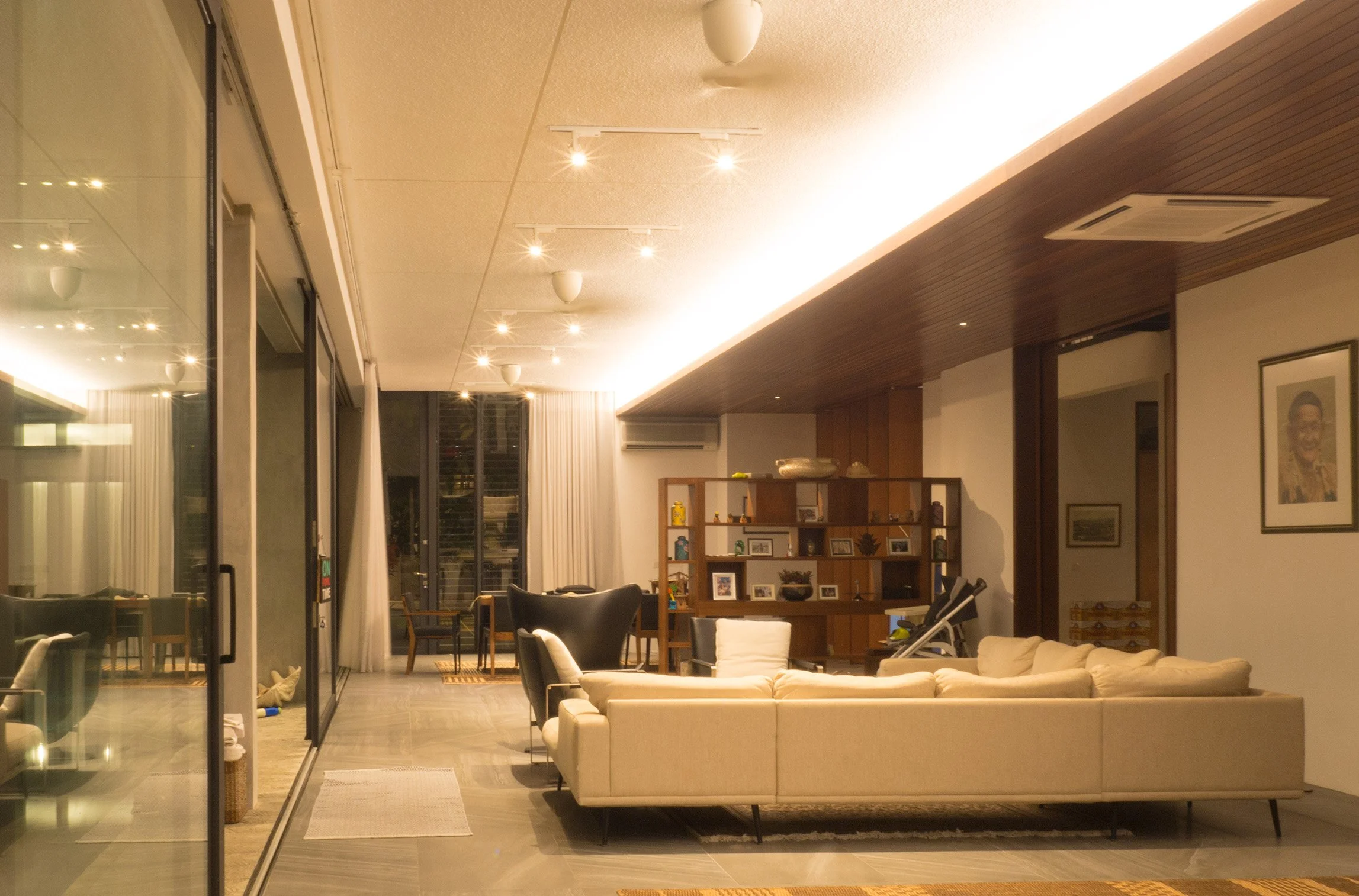 112 - The lobby of the new extension connects to a long gallery leading to the parents' house.jpg
