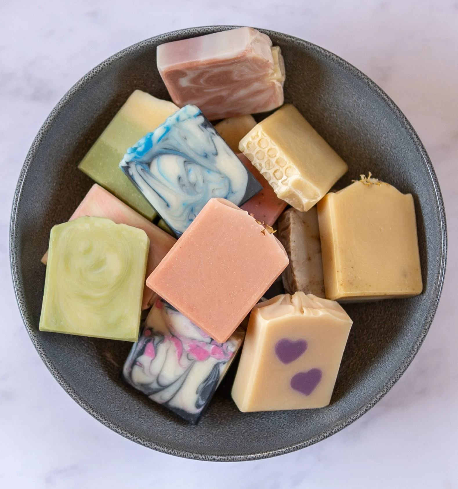 Selection of colourful handmade soaps made with natural ingredients