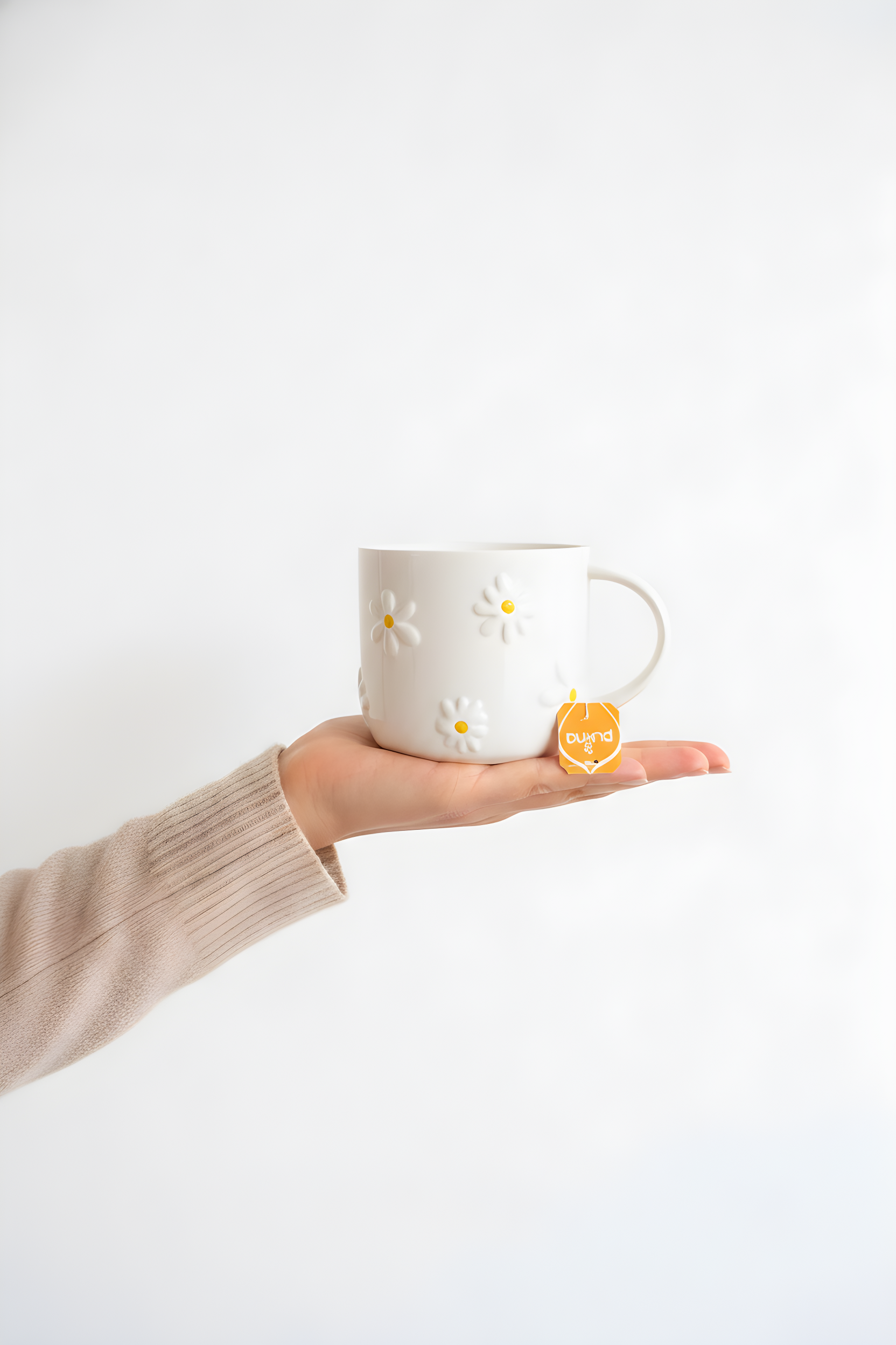 White ceramic mug with yellow floral design included in the blue skies gift hamper by Adaia Flora.