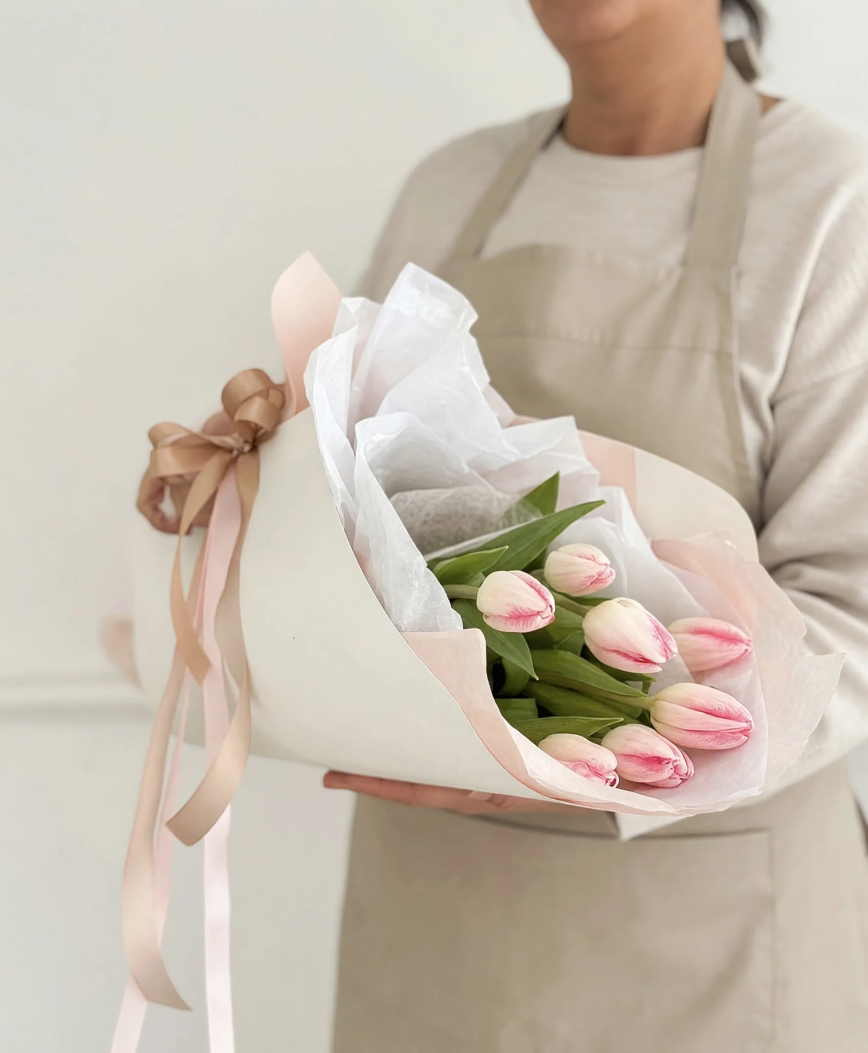 Close-up of colourful seasonal Tulips in the Adaia Flora Tulip Carrier,available for flower delivery in Hamilton, New Zealand.