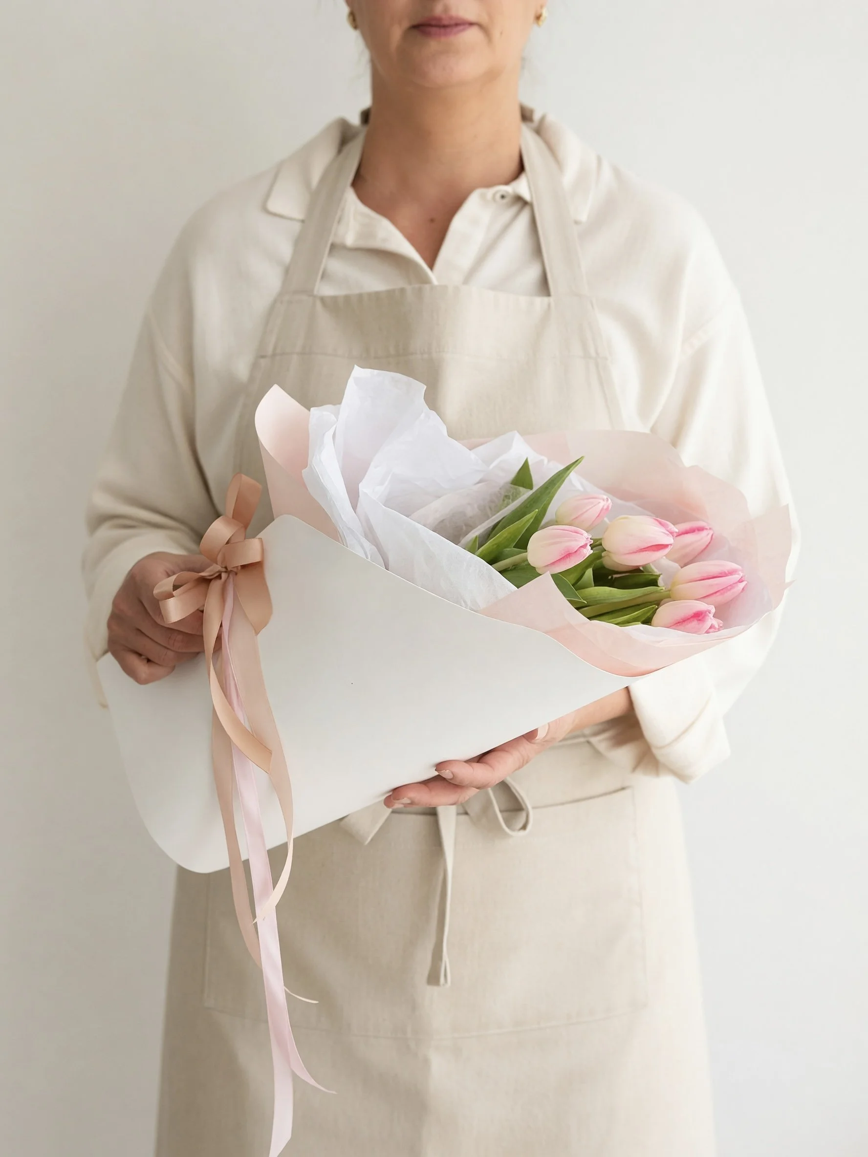 Fresh Tulip Carrier by Adaia Flora displaying 10 florist selected tulips in soft spring colours,perfect for gifting or home decoration