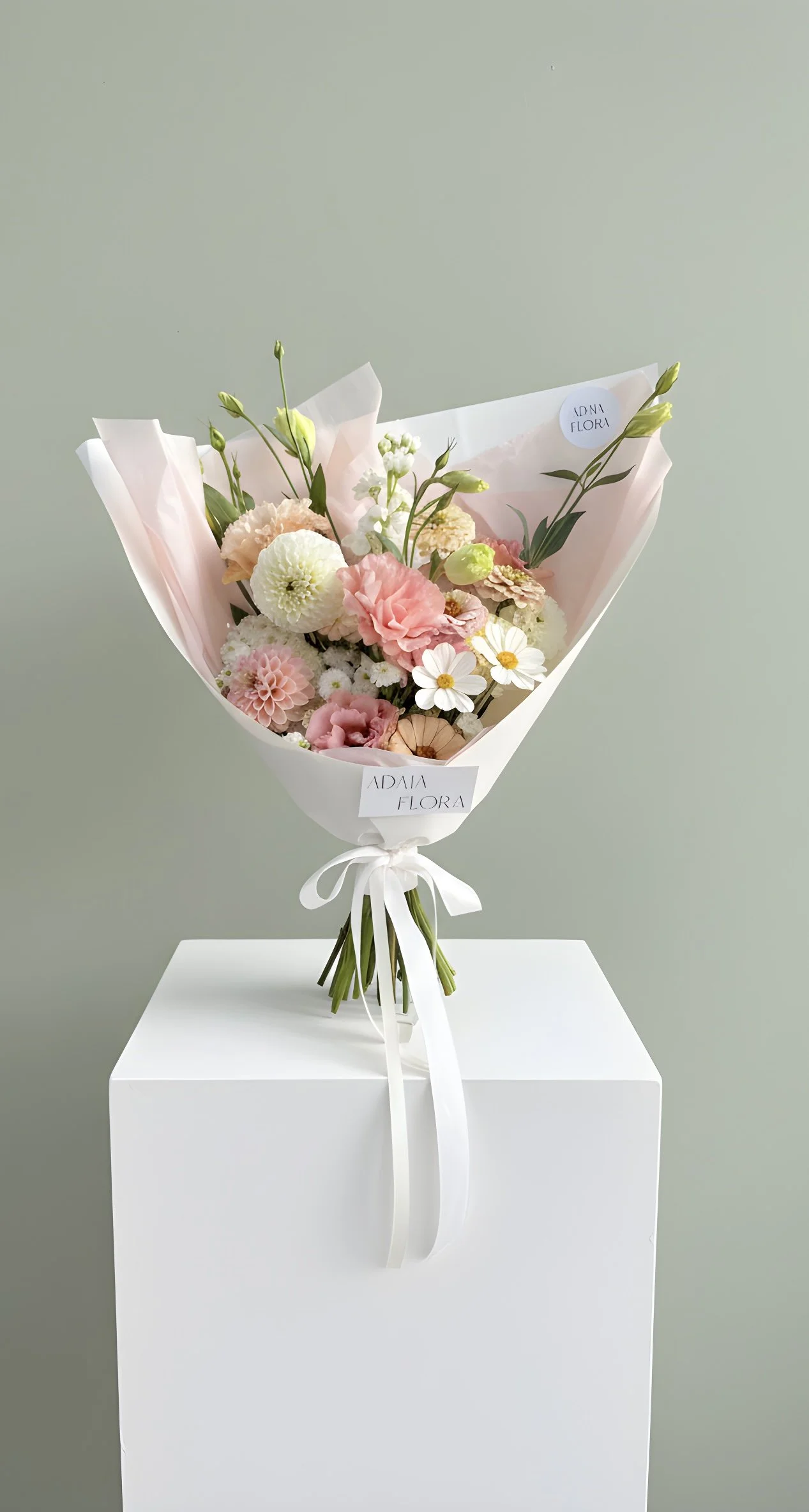 Blush mode bouquet featuring a soft selection of seasonal florals in pink and white toned flowers, available for delivery across Hamilton New Zealand.