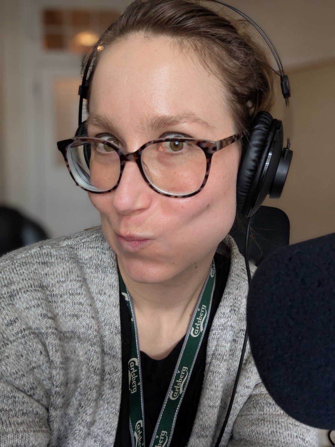  Copywriter and producer as voiceover artist: making faces to try to sound less like a sleep-aid before recording. 
