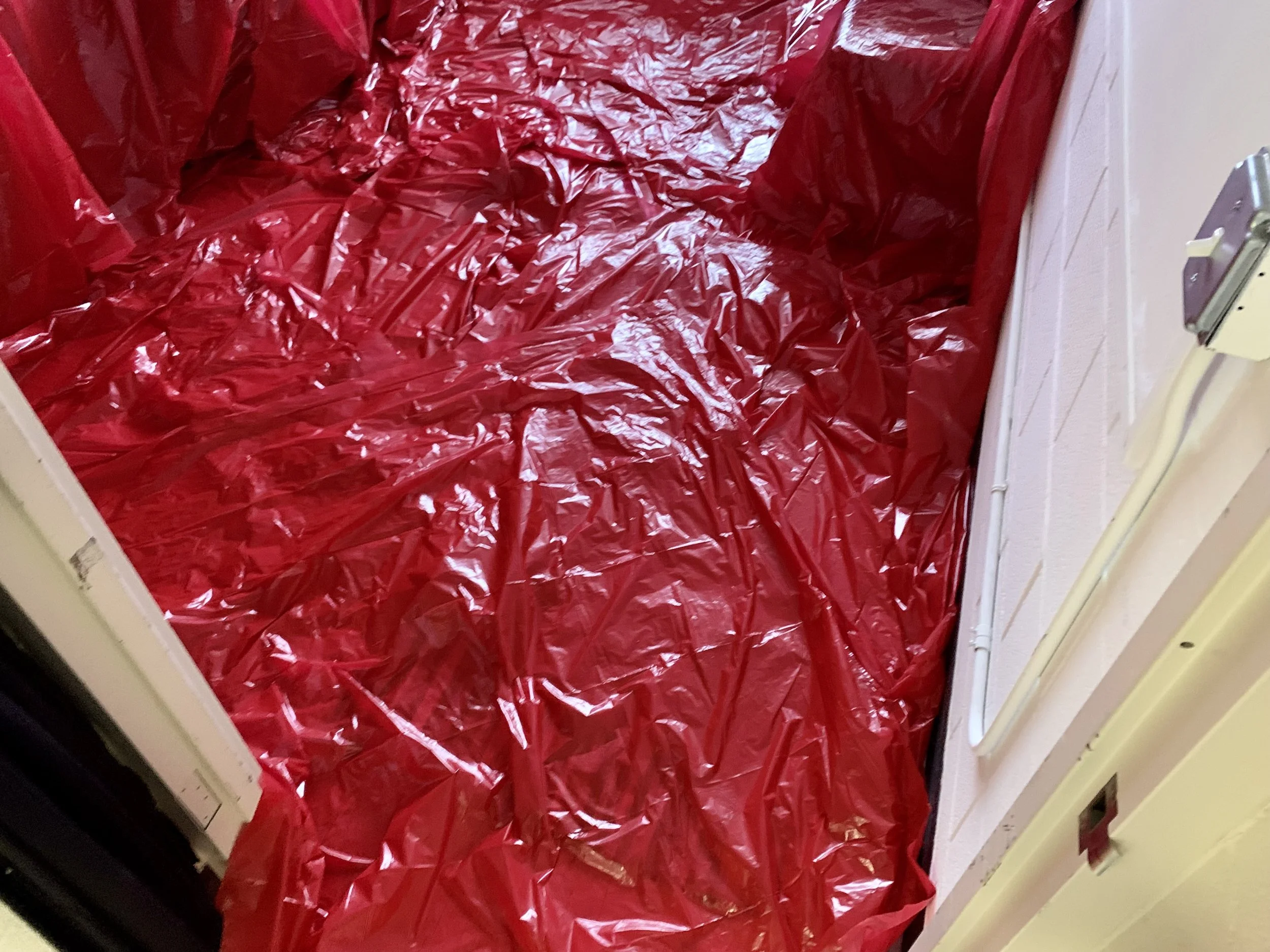 Example #3 of red-plastic- material onto ground.jpg.jpg