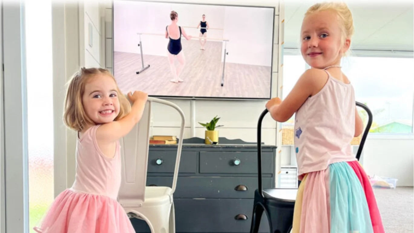 Young girl practicing ballet at home as part of her homeschool dance curriculum