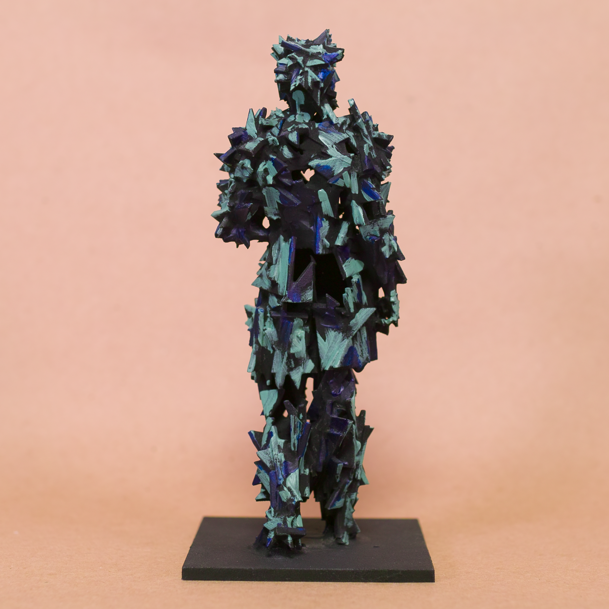 Contrapposto Doryphoros sculpture reimagined: fragmented jagged shard armor in black with iridescent blue-teal glints, brooding sentinel on black base by Mark G. Taber