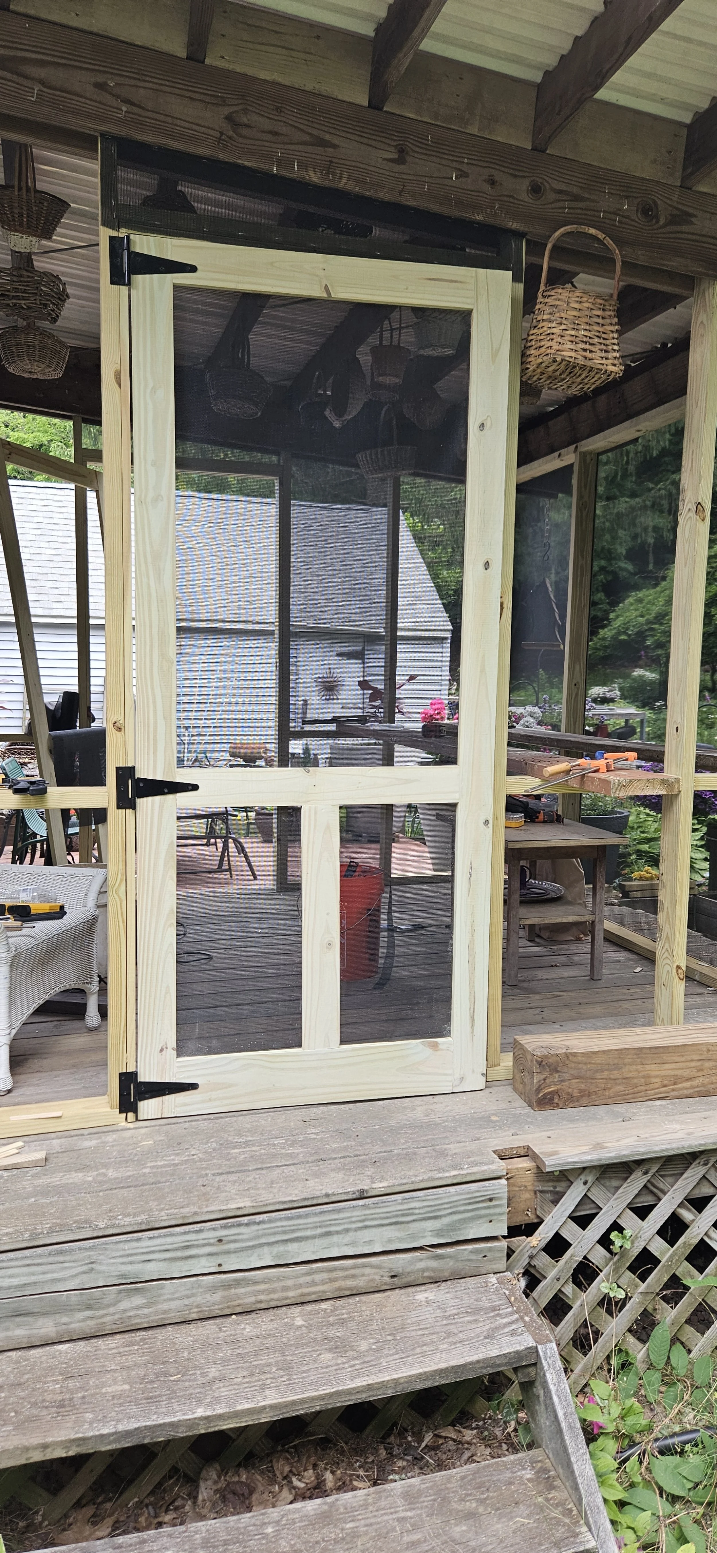 One door down (minus the latch and handle), one to go.