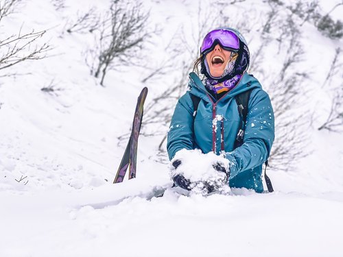 woman in powder snow nozawa onsen japan