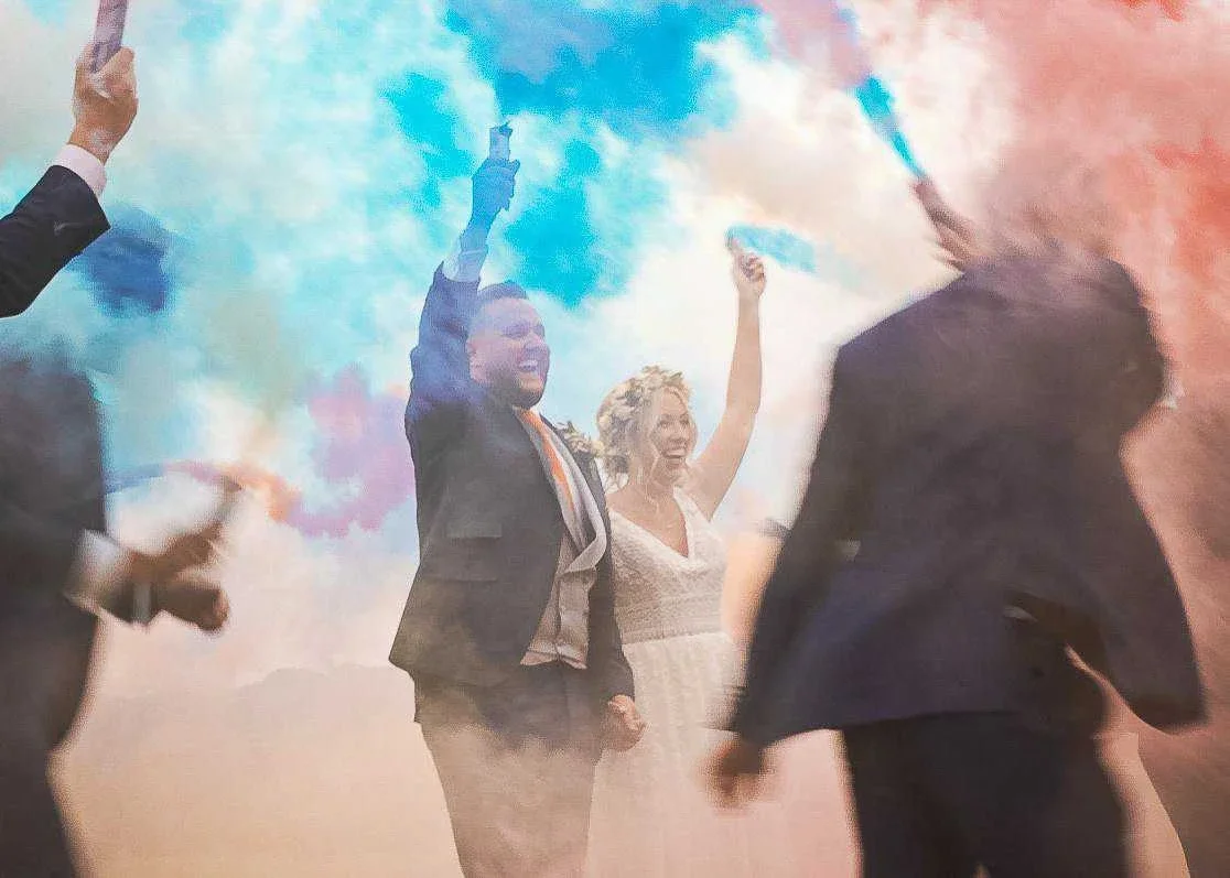 Couple doing confetti walk at the Old Cowshed Wedding Video