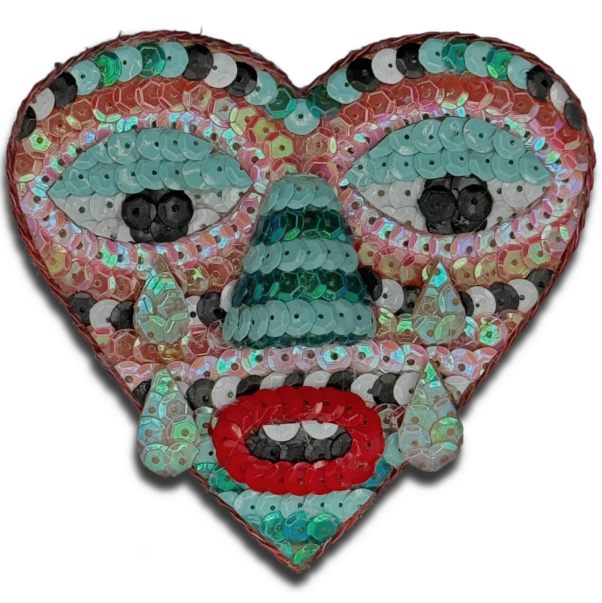 A heart-shaped mosaic made of colorful sequins and sequined patches, featuring a clown face with red lips, white teeth, a blue nose, and teardrops, on a black background.