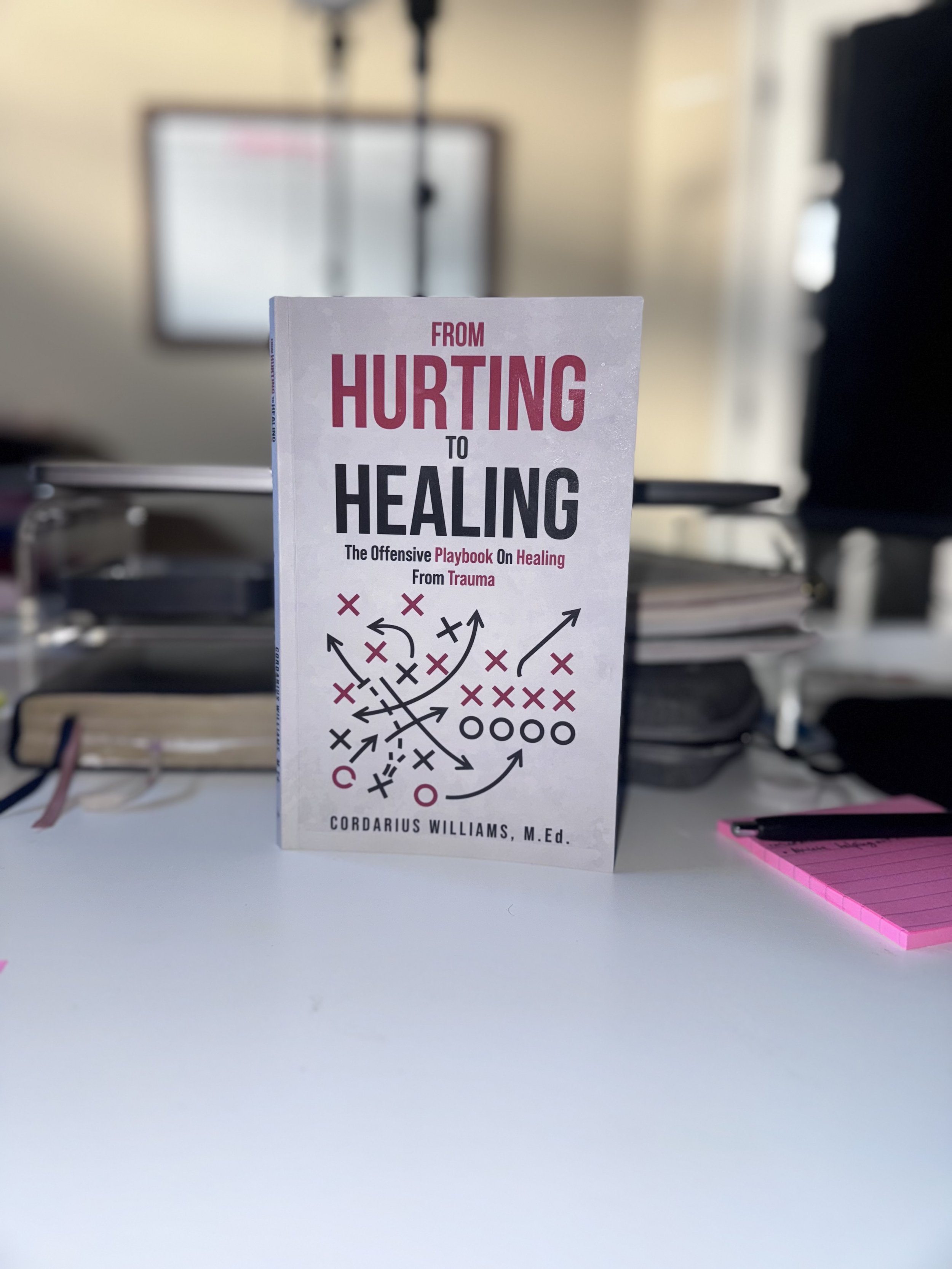 From Hurting to Healing: The Offensive Playbook on Healing from Trauma (Signed Copy + Bookmark)