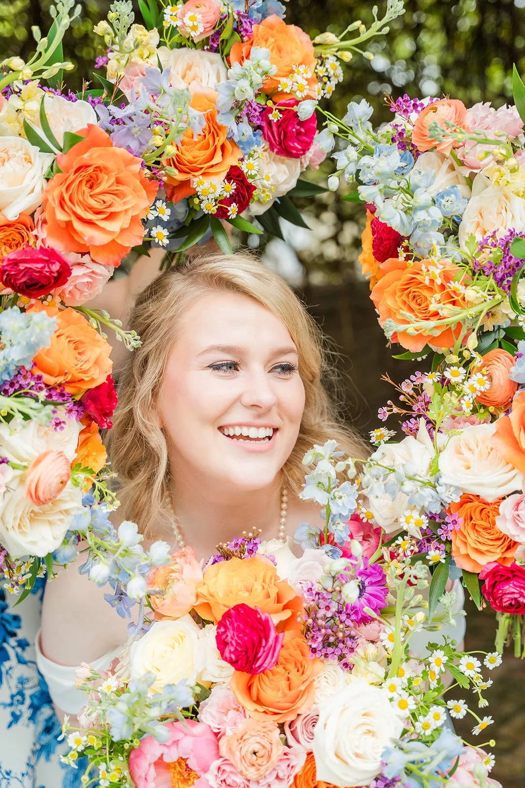 Bride surrounded by bridesmaids bouquets.jpg