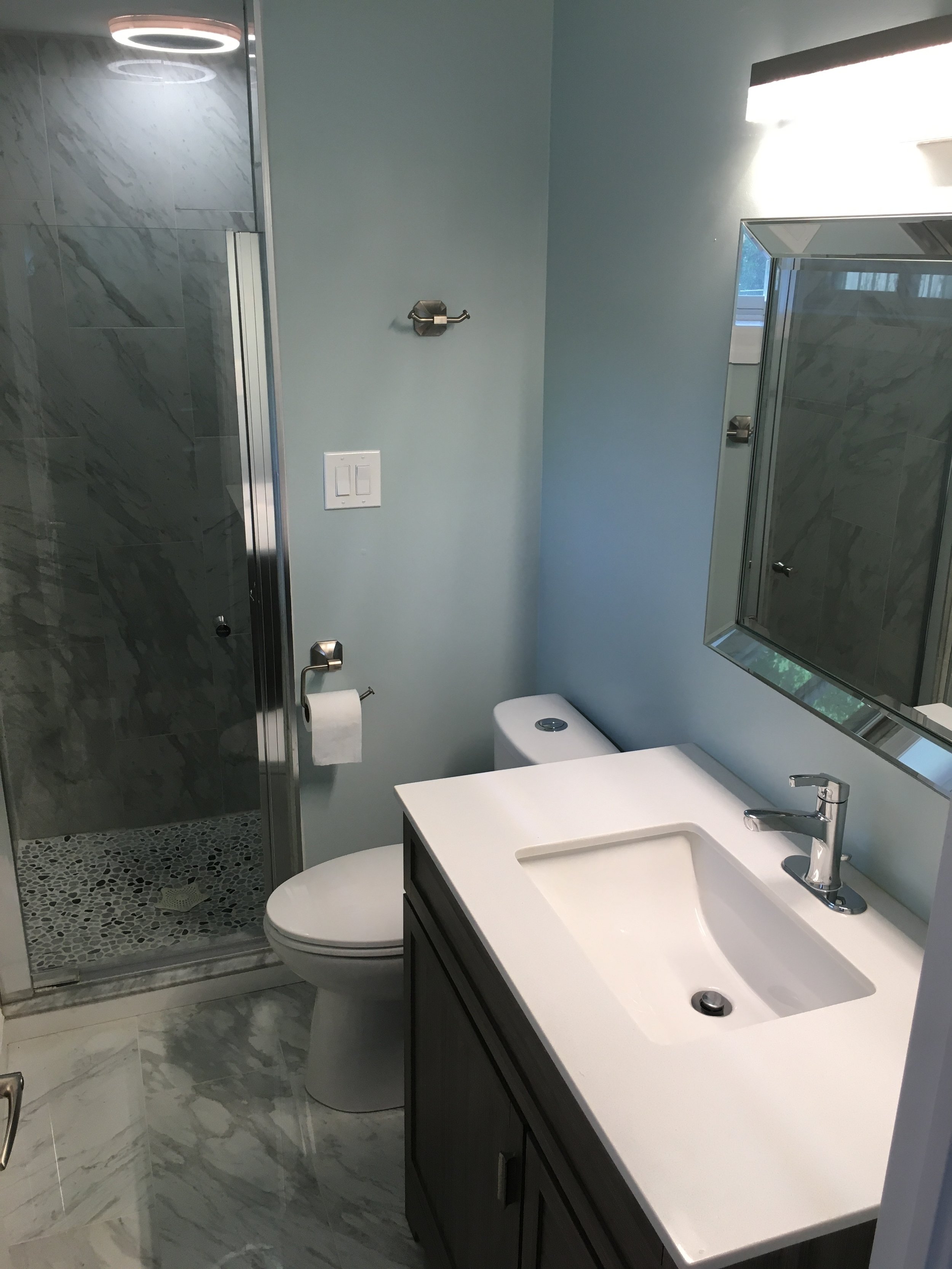 Updated bathroom glass shower renovation Kitchener