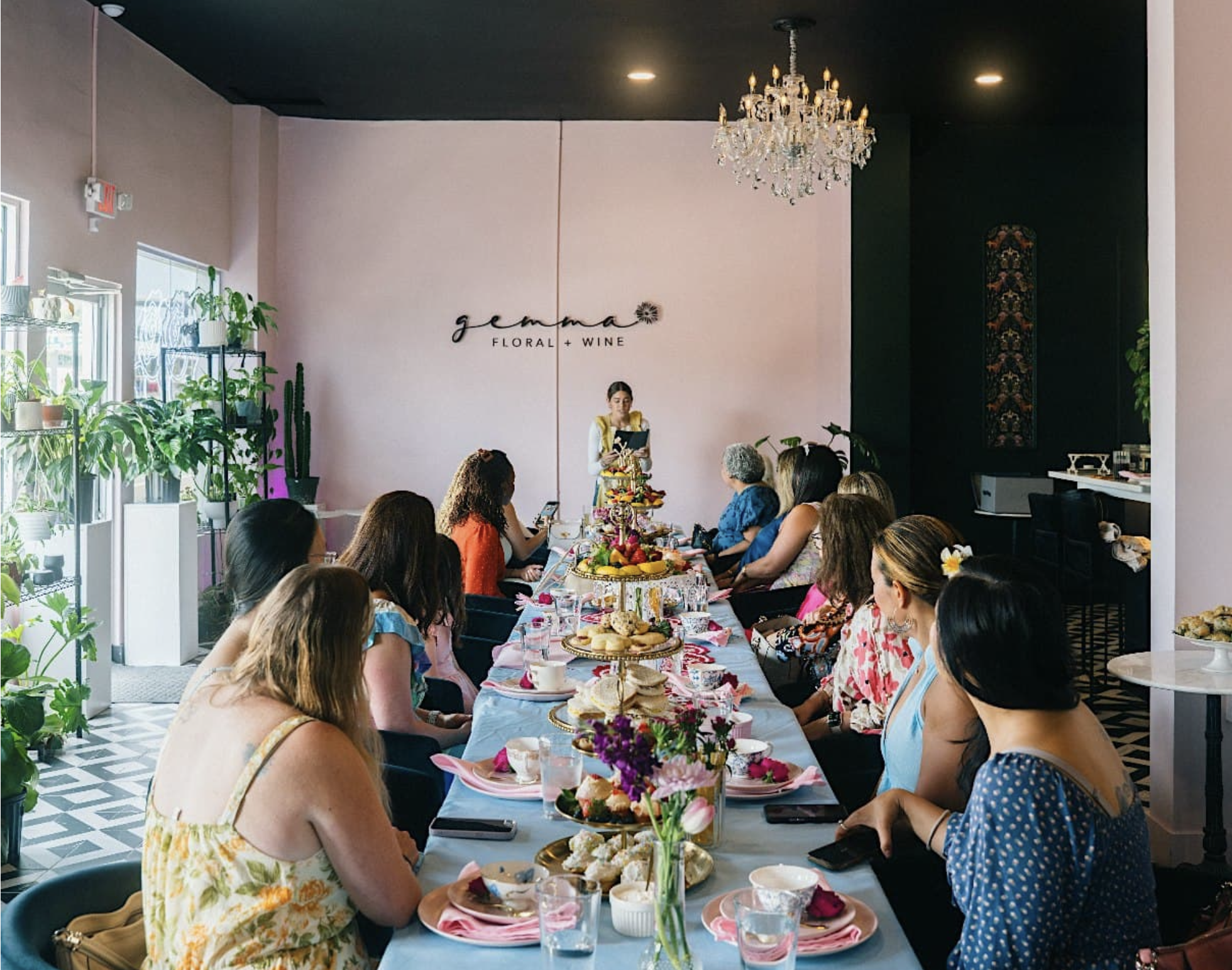 Friends attend a Royal Tea