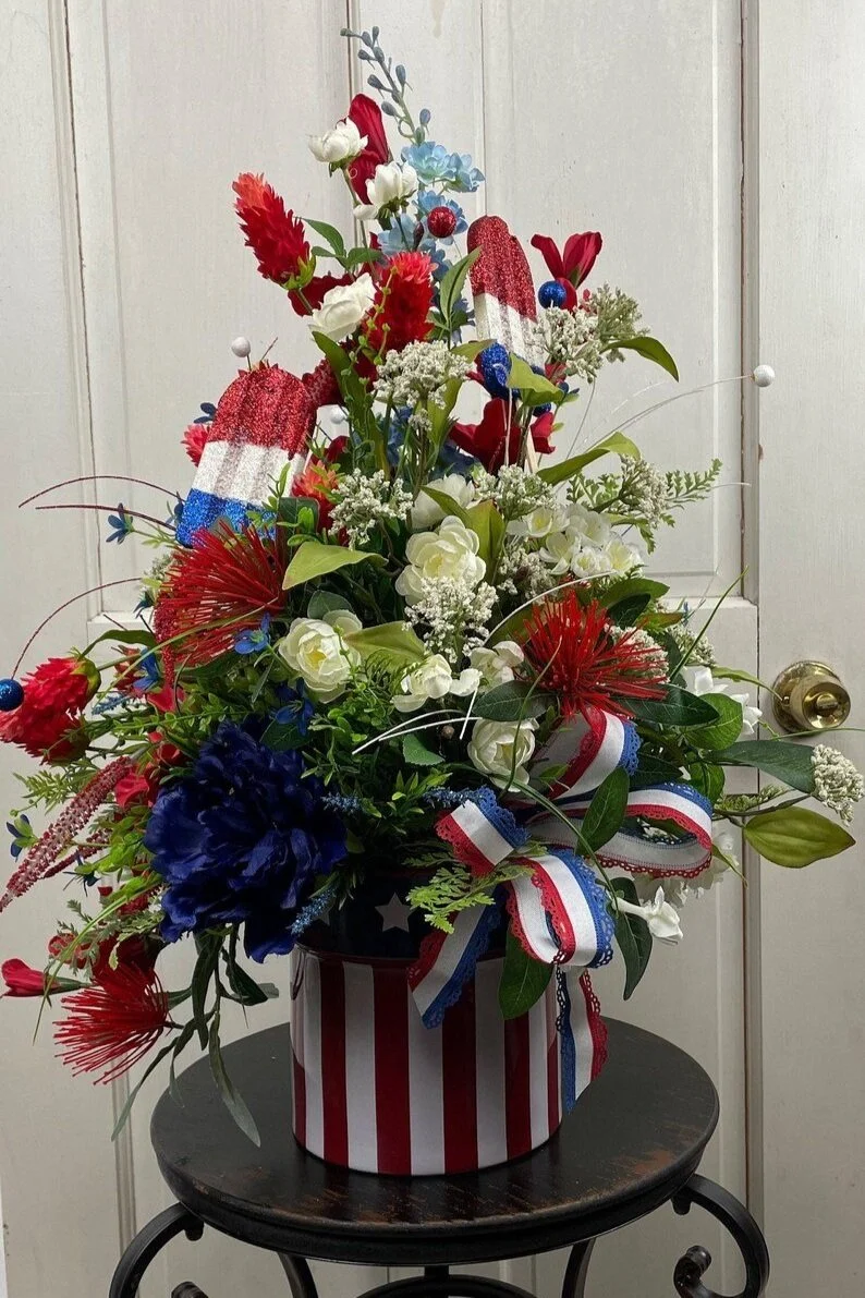 Summer Tabletop Floral, Patriotic Arrangement with Faux Flowers, Red, White, and Blue Centerpiece in Star and Stripe Ceramic Container
