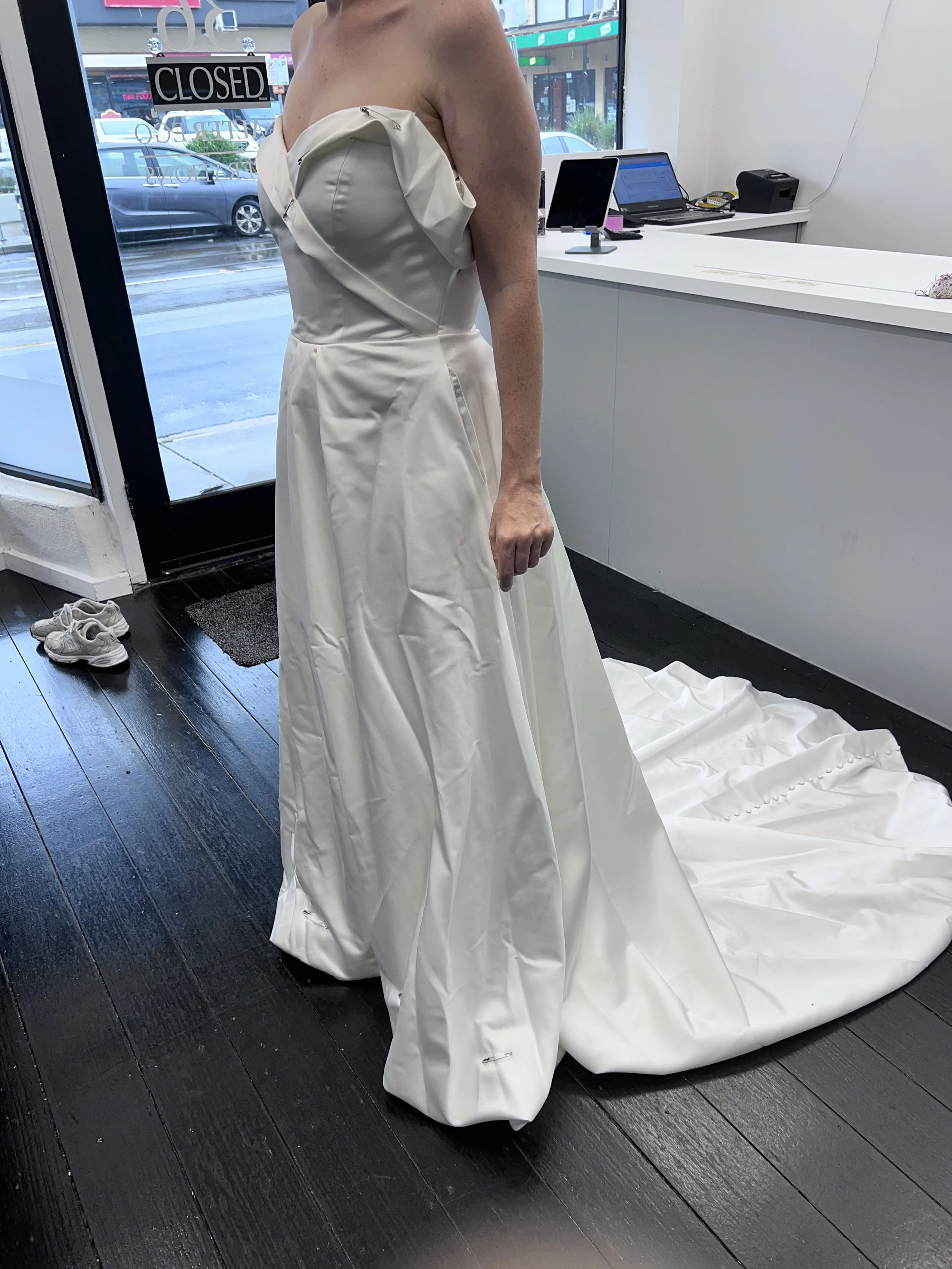 Bride in altered wedding gown