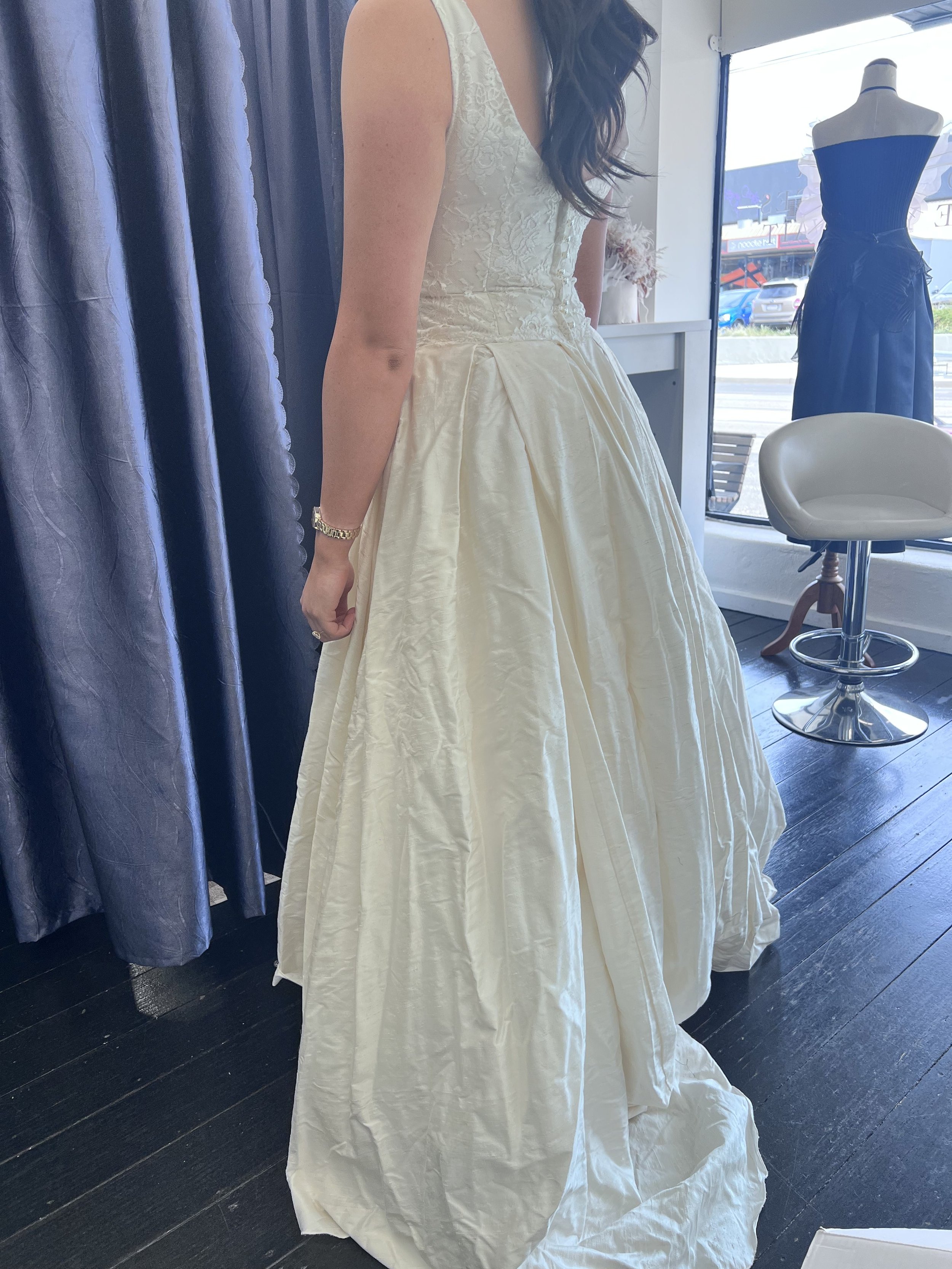 Happy bride after wedding dress fitting