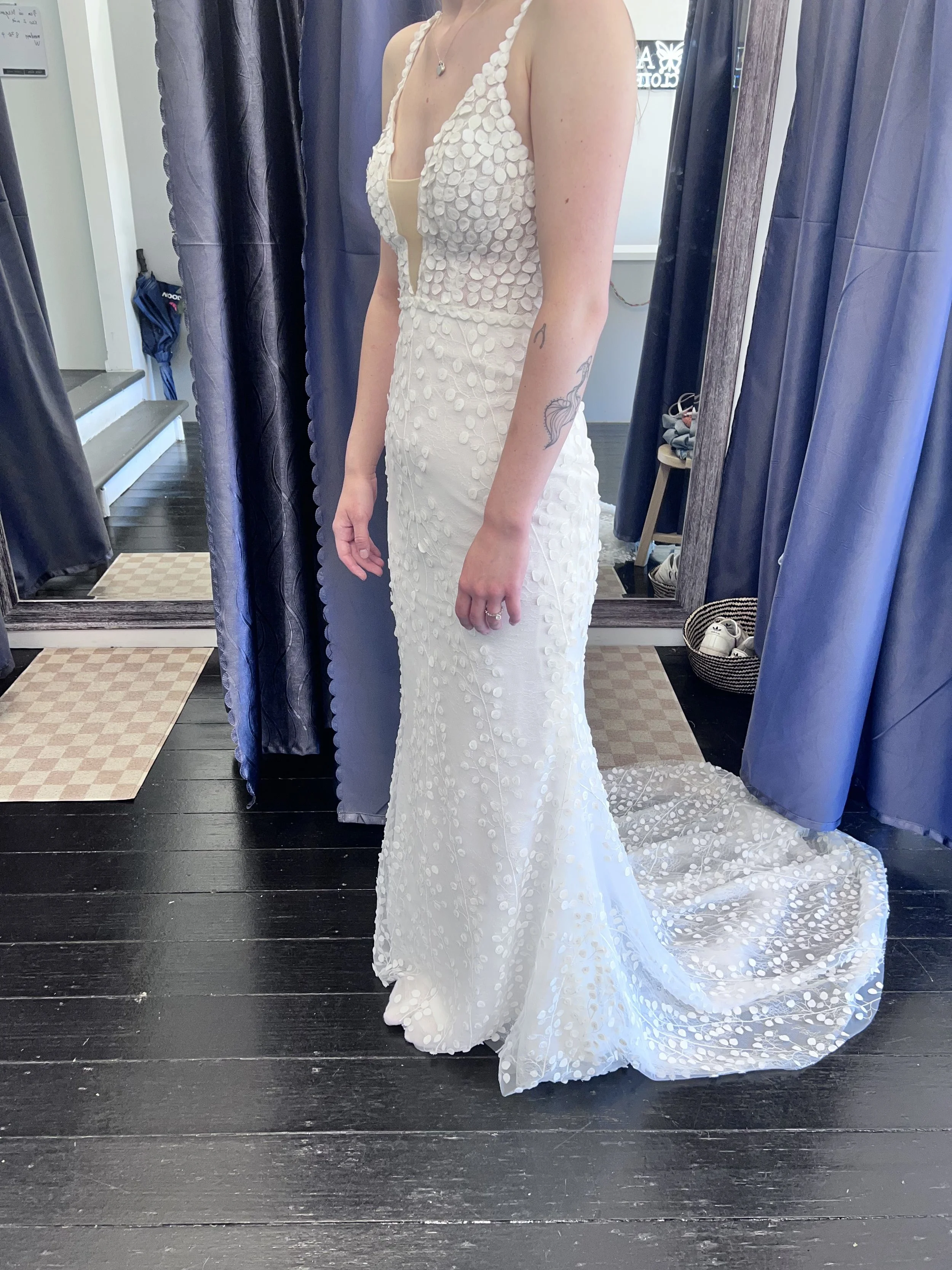 Completed bridal gown alteration showing perfect fit