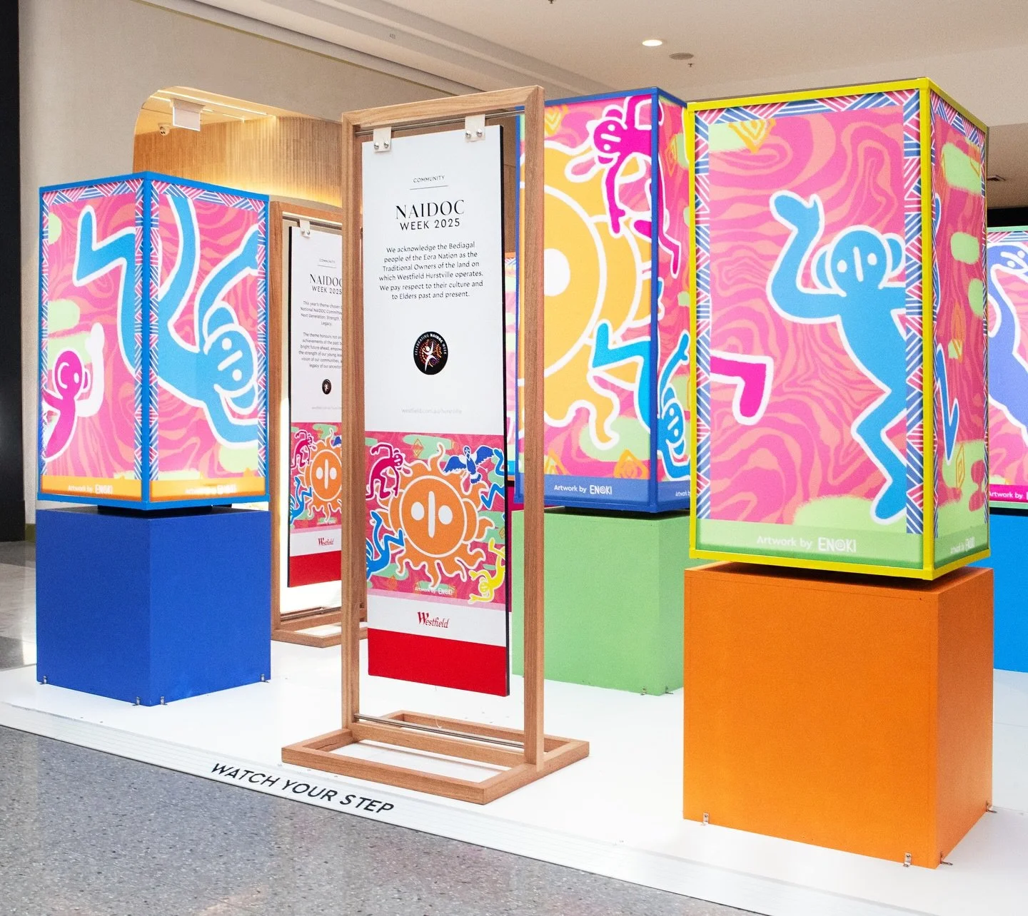 A past NAIDOC Week installation designed to be experienced and not just viewed! 1/3

This activation features a series of interactive light-up display boxes, creating an engaging walkthrough experience in a busy retail space. Each cube features strik