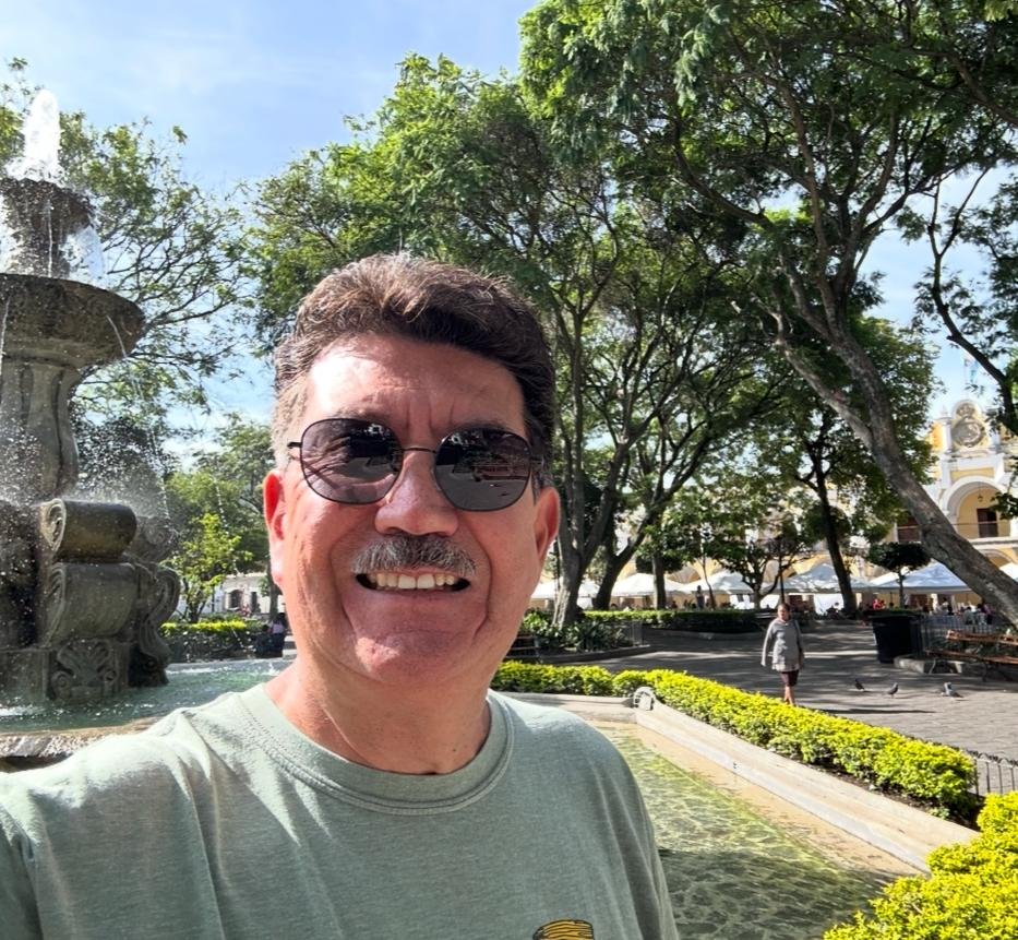 Happy customer of Antigua Plumbing in front of Central Park in Antigua Guatemala