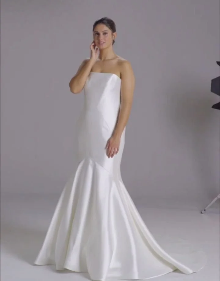 OBERON by Pronovias 🤍
This beautiful dress arrives in store tomorrow morning! 

One gown. 
One chance to be the FIRST to join our #ConsciousBrideTribe.

Refined, sculpted, and effortlessly elegant &mdash; OBERON is a strapless mikado mermaid gown de
