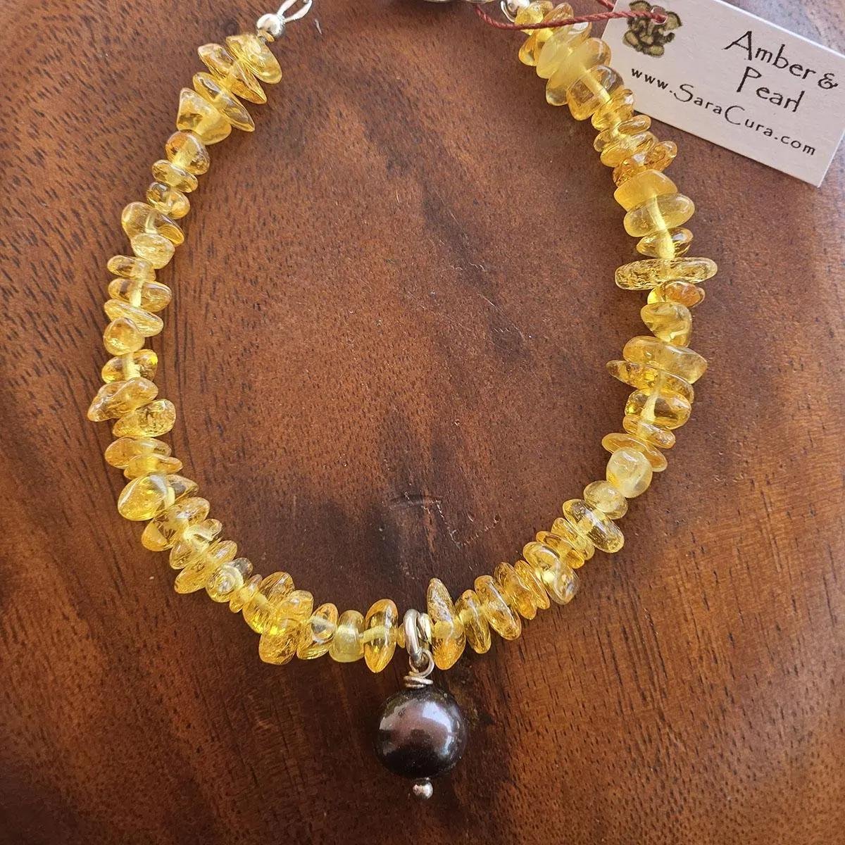 Amber-and-Pearl-Adjustable-Bracelet-with-Charm-2.jpg