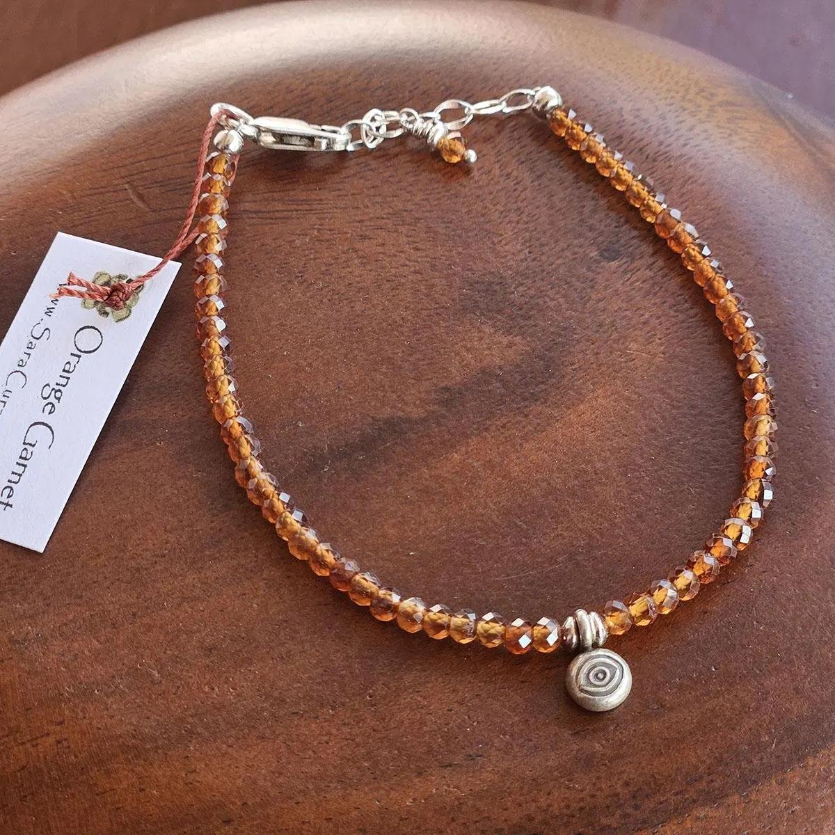 Orange-Garnet-Adjustable-Bracelet-with-Silver-Charm-4.jpg