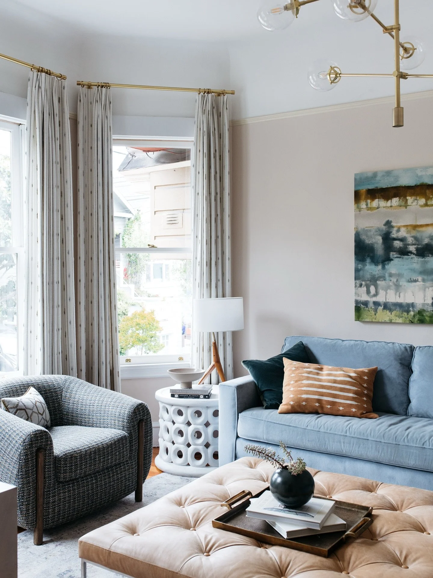 Kid and pet-friendly! This room is packed with soft curves, padded edges, durable tables, and performance fabrics (even ones that cats can&rsquo;t claw!). Repeating subtle shapes, in this case curves/circles, brings rhythm and a sense of fun througho