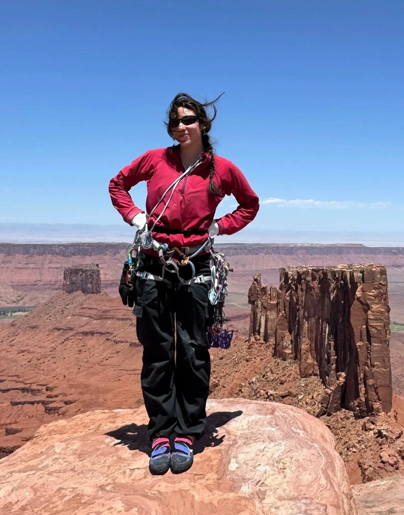 Olivia Call rock climbing in southern Utah's red rock country