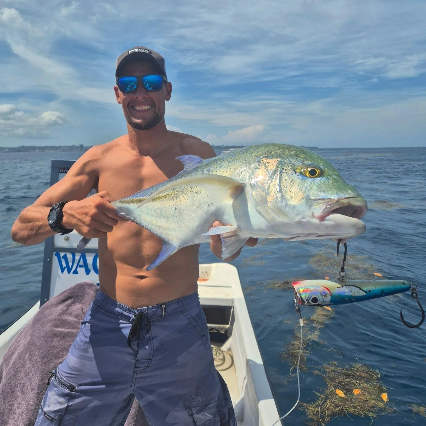 Captain Lyle hooked a blue fin on a surf and fishing trip