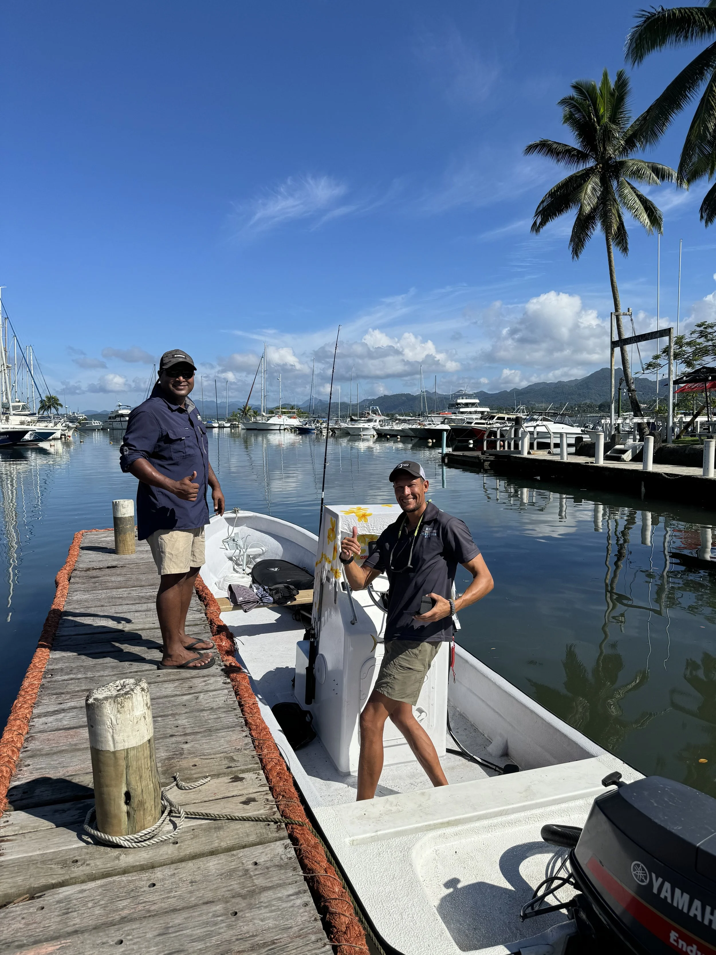 Our Captains getting ready for a surf trip to Suva Reef