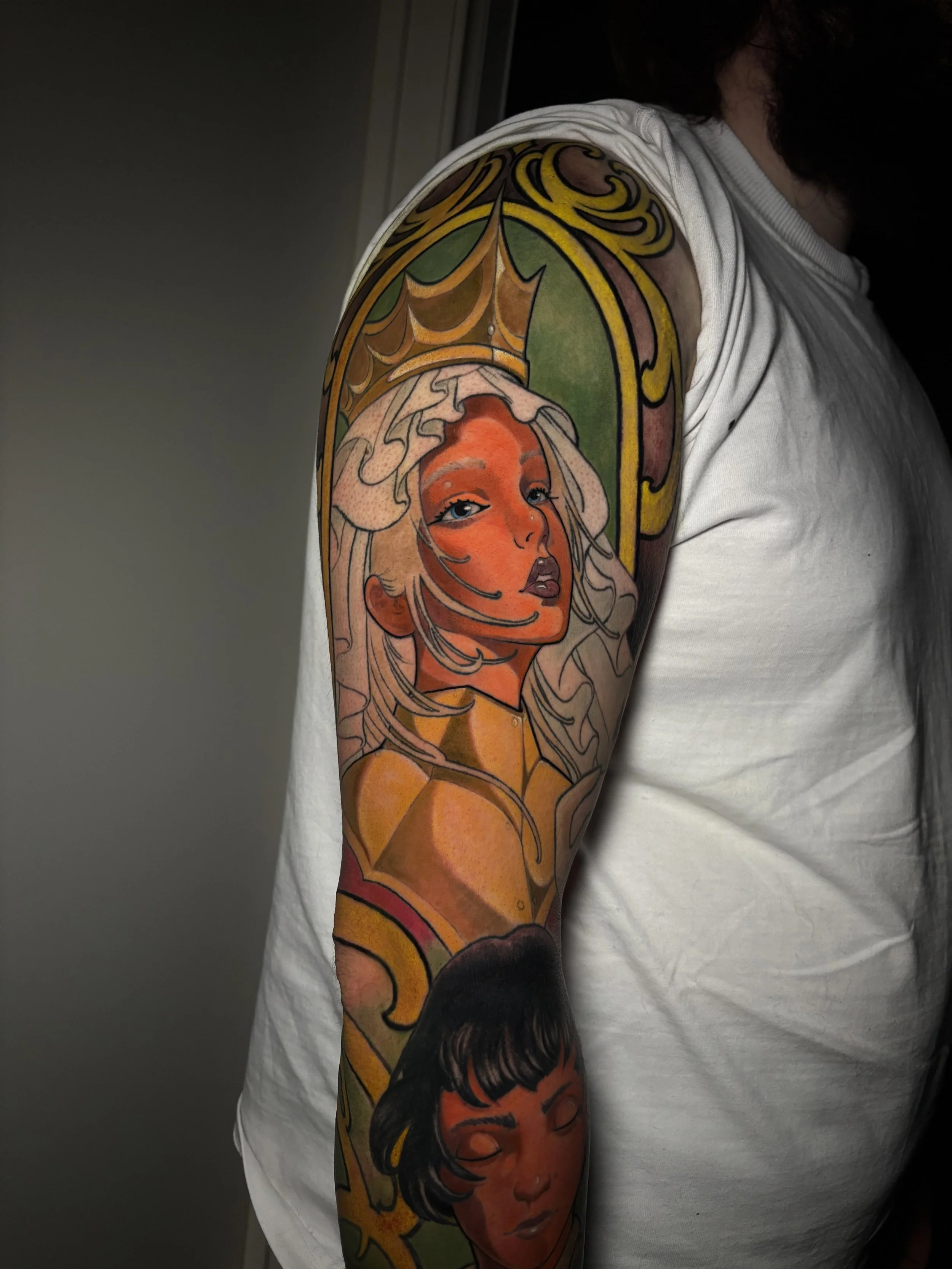 Neo-traditional woman portrait sleeve with a gold ornamental frame by Nicklas Wong, tattoo artist in Northcote, Melbourne