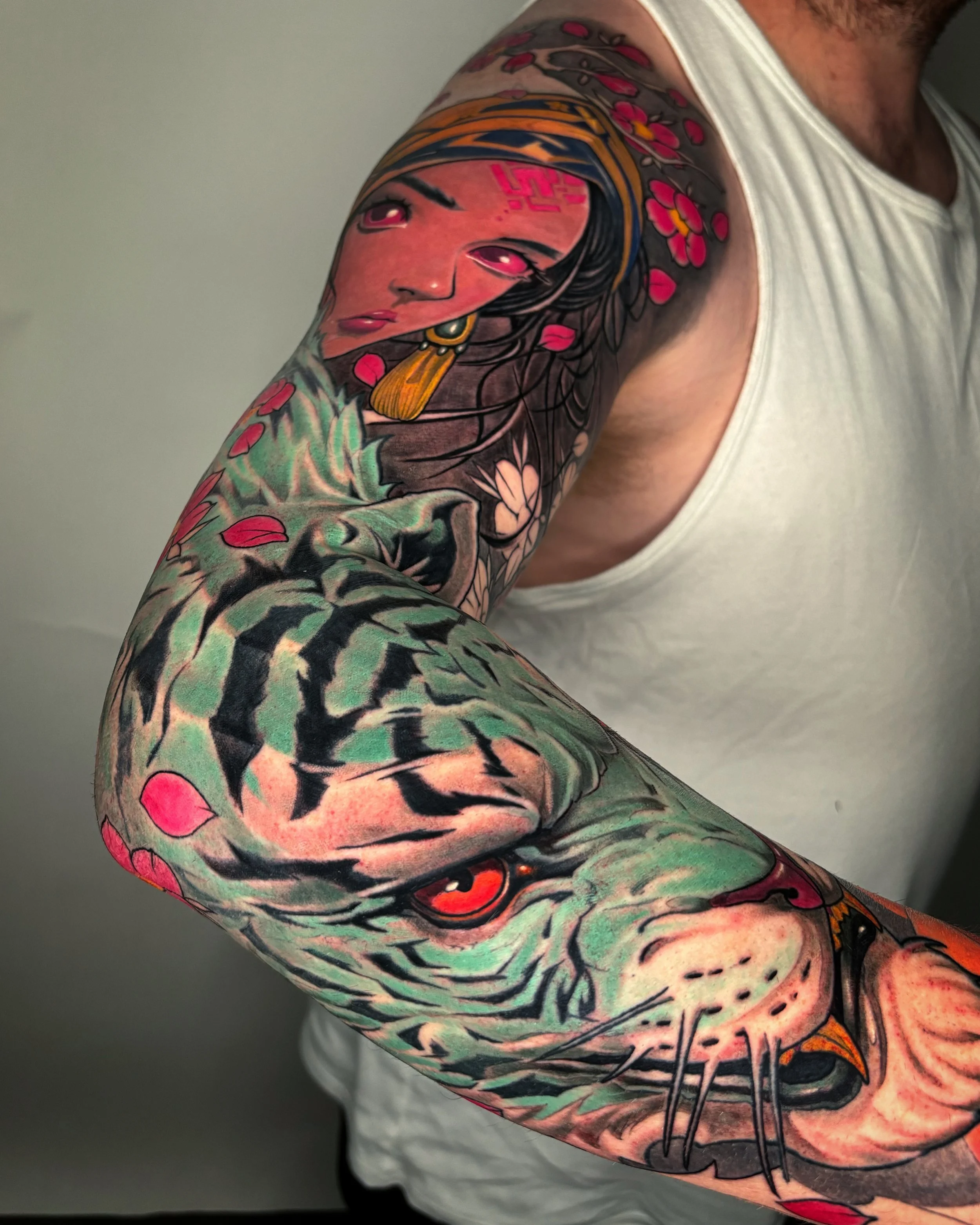 Neo-traditional sleeve with a woman portrait, skeleton and green flowing shapes by Nicklas Wong, tattoo artist in Northcote, Melbourne
