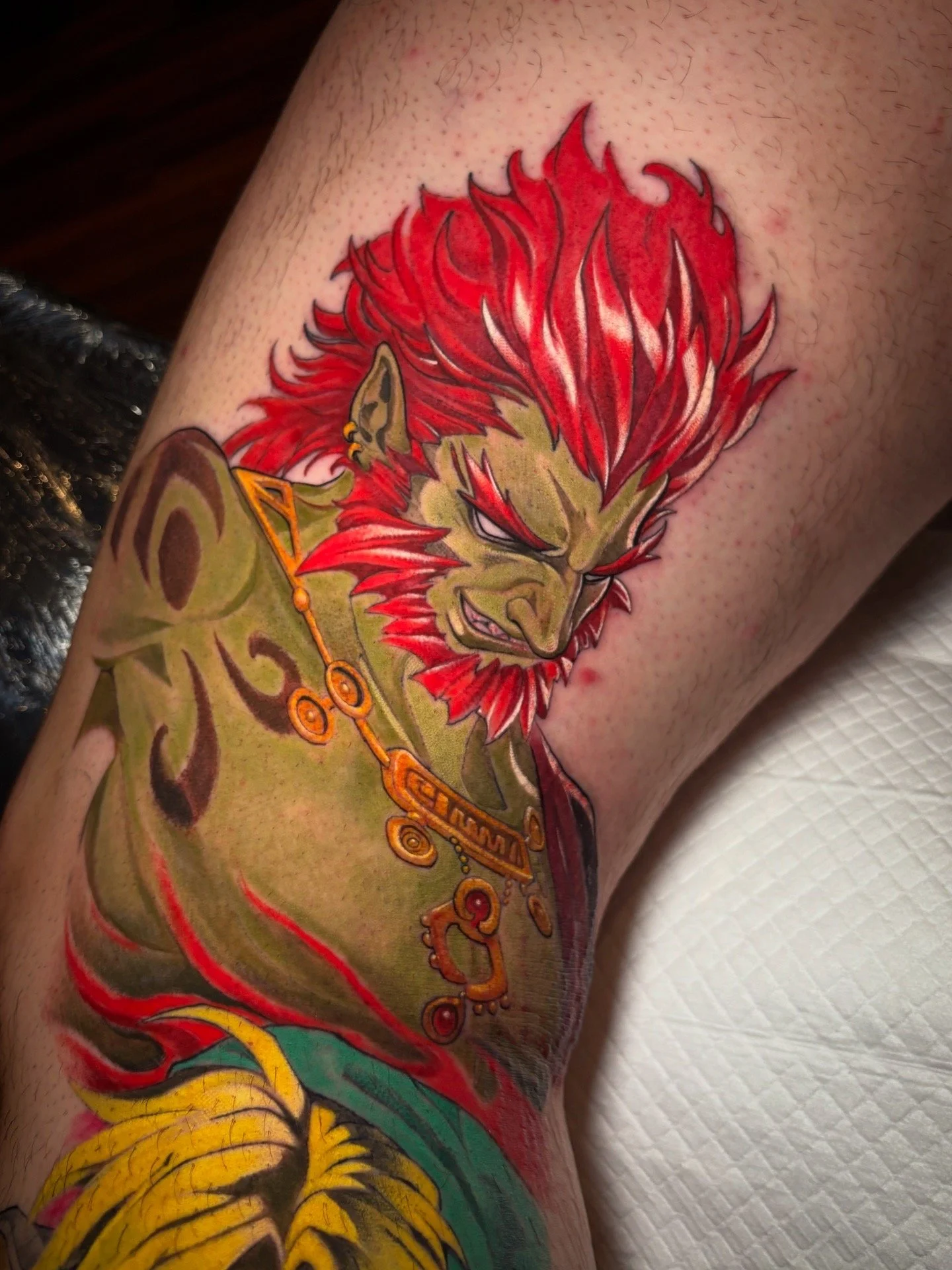 Ganondorf character tattoo with red hair and green skin by Nicklas Wong, tattoo artist in Northcote, Melbourne