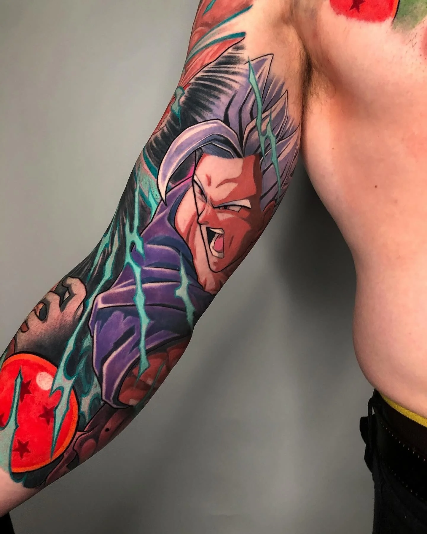 Anime character sleeve detail with silver hair and purple clothing by Nicklas Wong, tattoo artist in Northcote, Melbourne