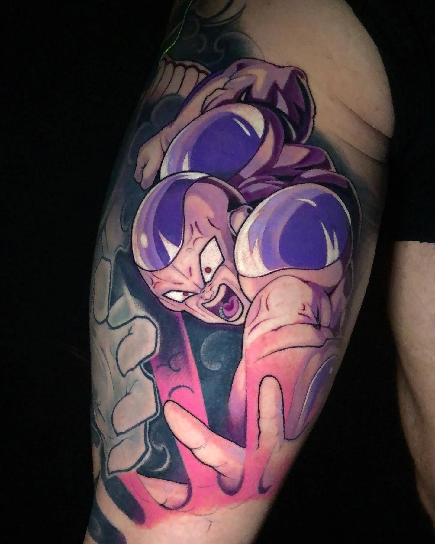 Dragon Ball Frieza upper-arm tattoo in white, purple and pink by Nicklas Wong, tattoo artist in Northcote, Melbourne