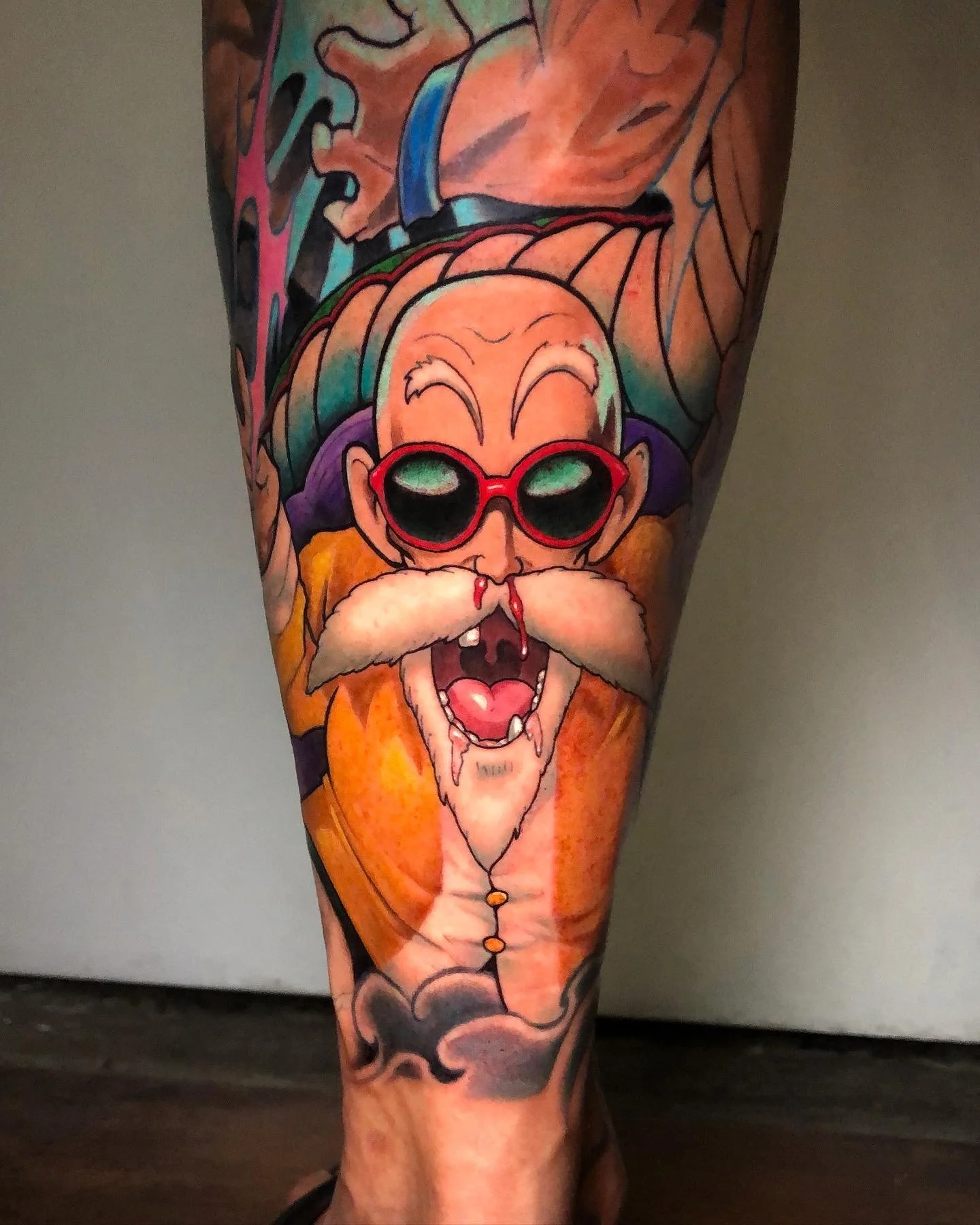 Dragon Ball Master Roshi tattoo with sunglasses and a white beard by Nicklas Wong, tattoo artist in Northcote, Melbourne