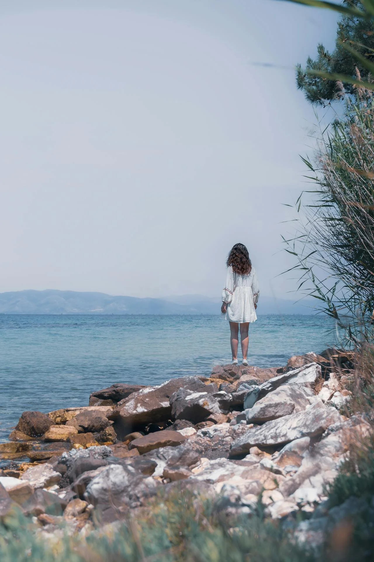 woman contemplating decision - should I stay or go?