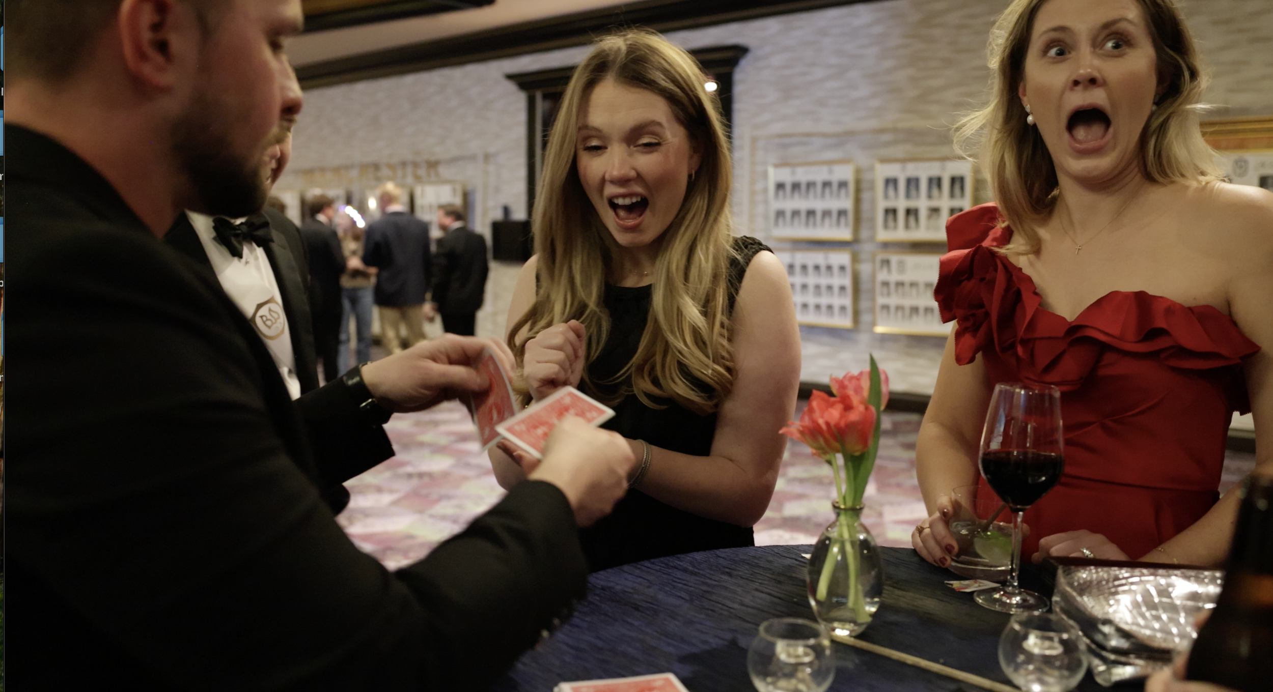 Wedding guest delighted by close-up card magic from Austin magician Michael Rogerson