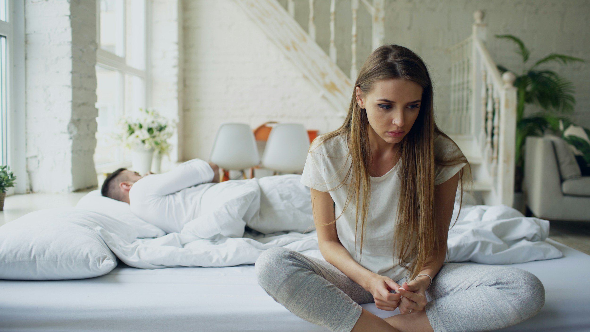 Couple experiencing emotional distance and relationship anxiety rooted in emotional abandonment — online therapy Inese Jegorova UK