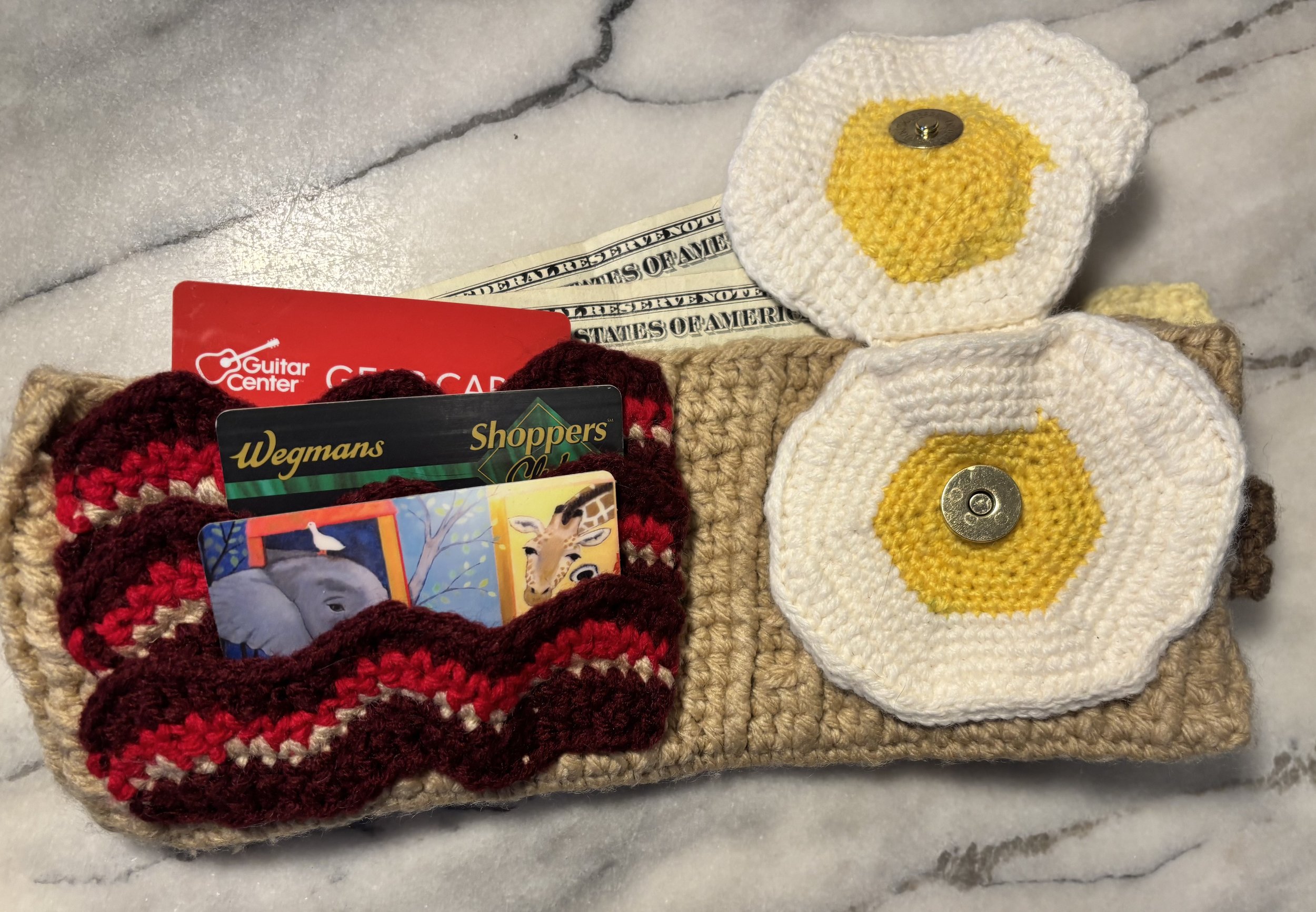 Waffle Wallet, 2024, original pattern crocheted in acrylic.