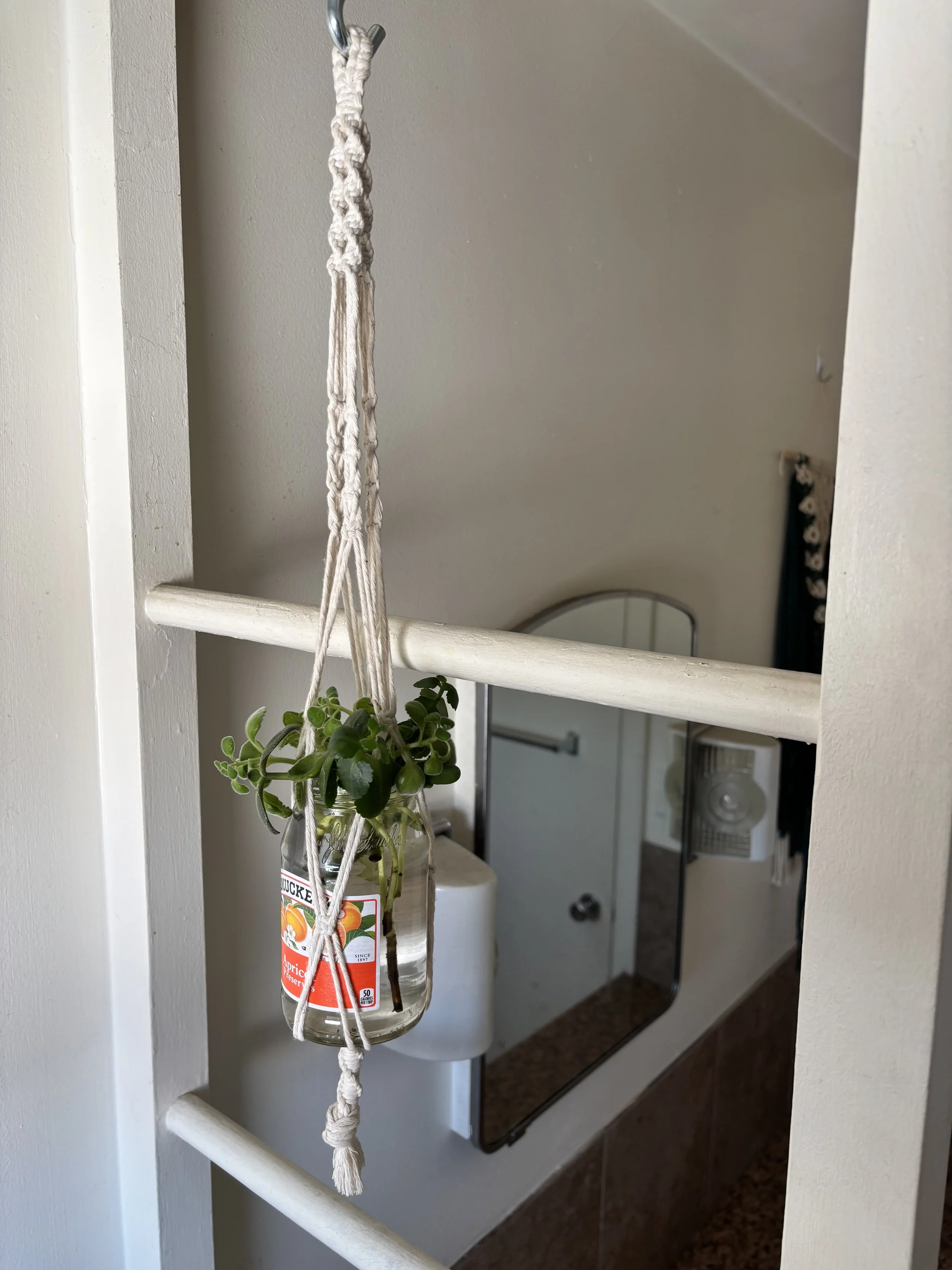 Small Hanging Pant Holder, 2025, cotton yarn.