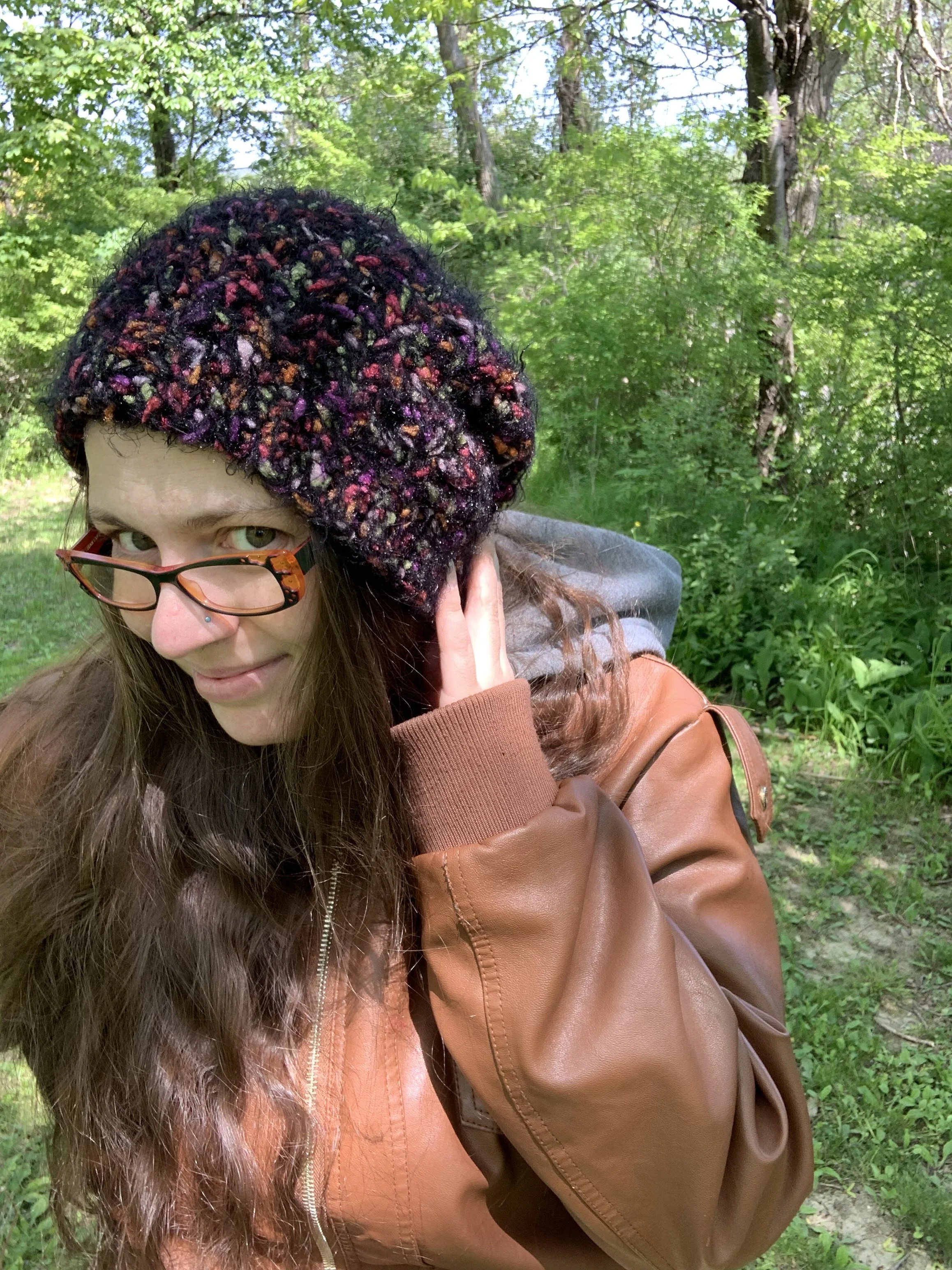 Rainbow in the Dark Beanie, 2022, crocheted in rayon and acrylic.