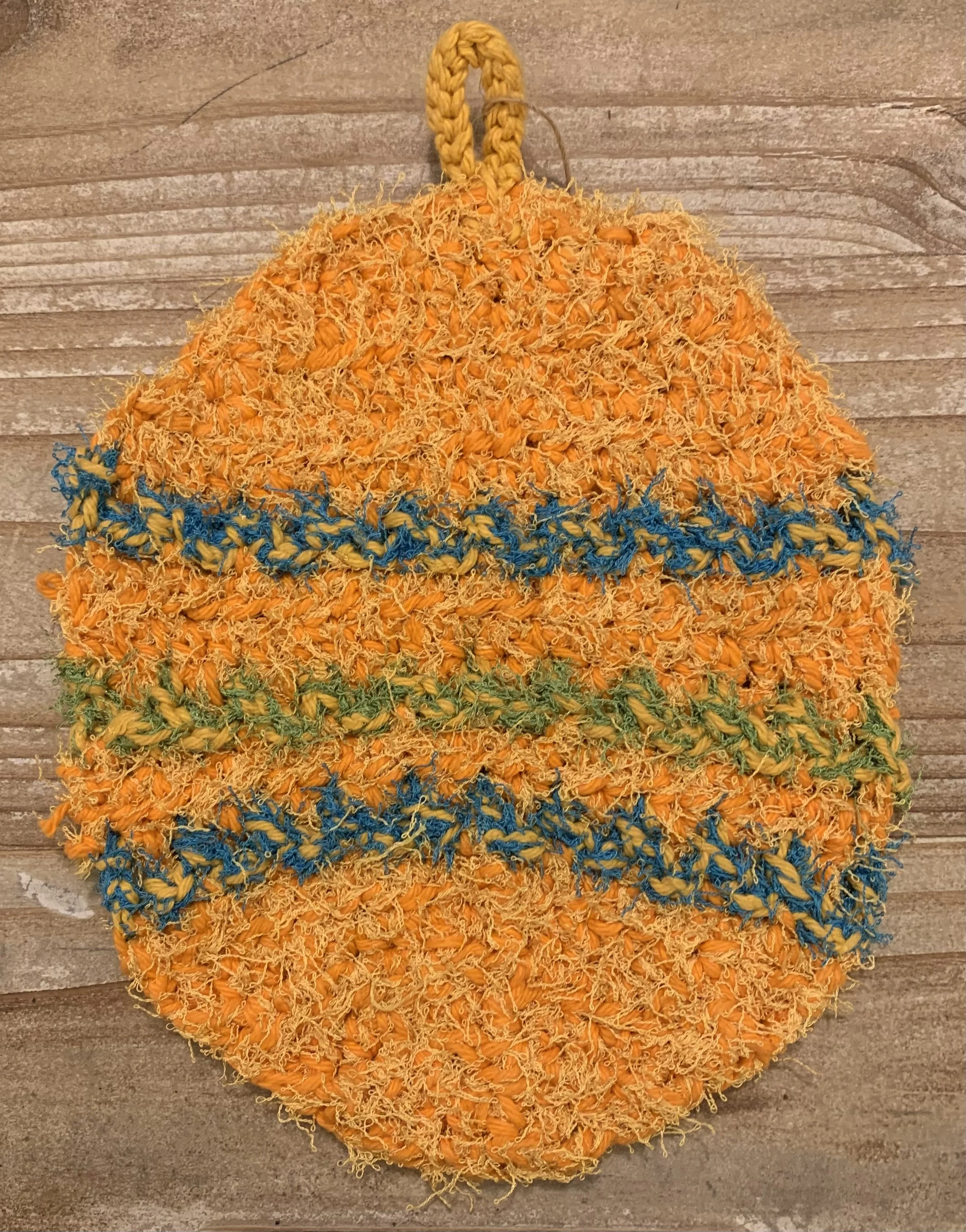 Painted Egg Potholder, 2015, original pattern crocheted in cotton and polyester.
