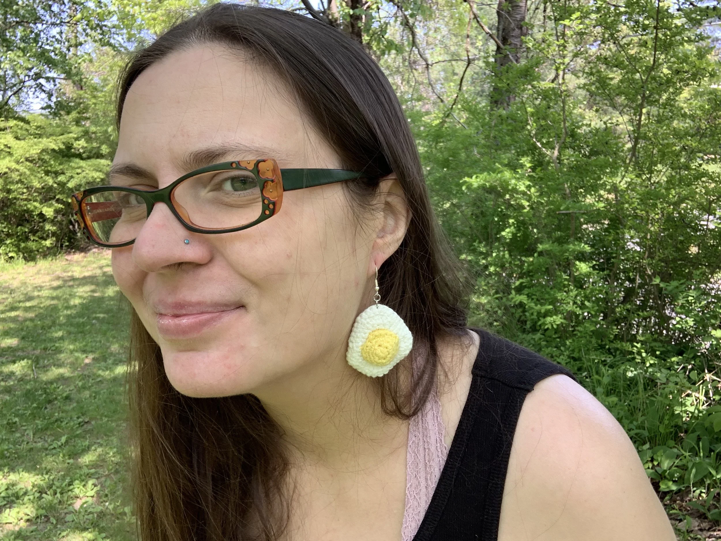 Egg Earring, 2022, original pattern crocheted in cotton.