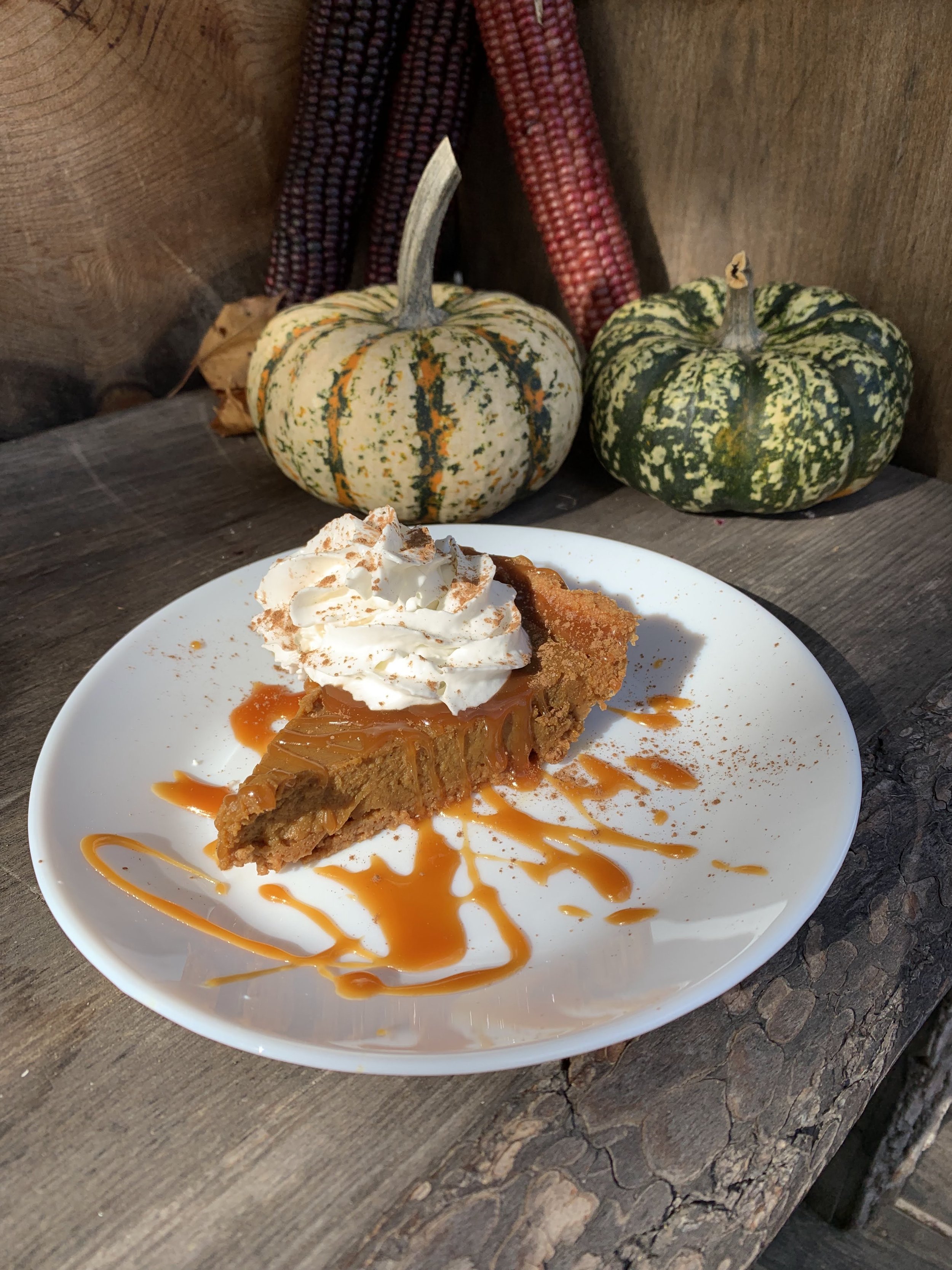 Pumpkin Pie with homemade caramel sauce