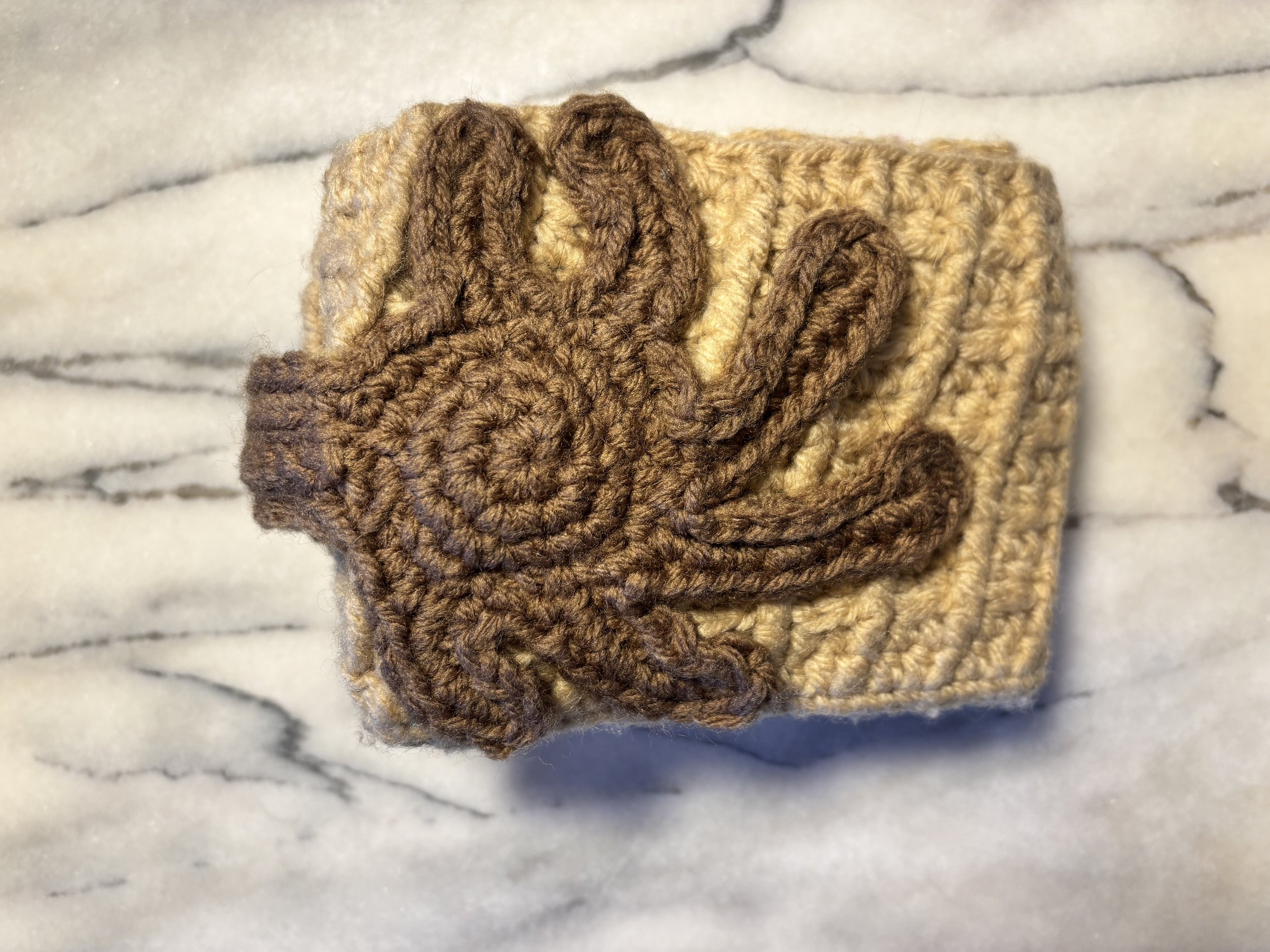 Waffle Wallet, 2024, original pattern crocheted in acrylic.